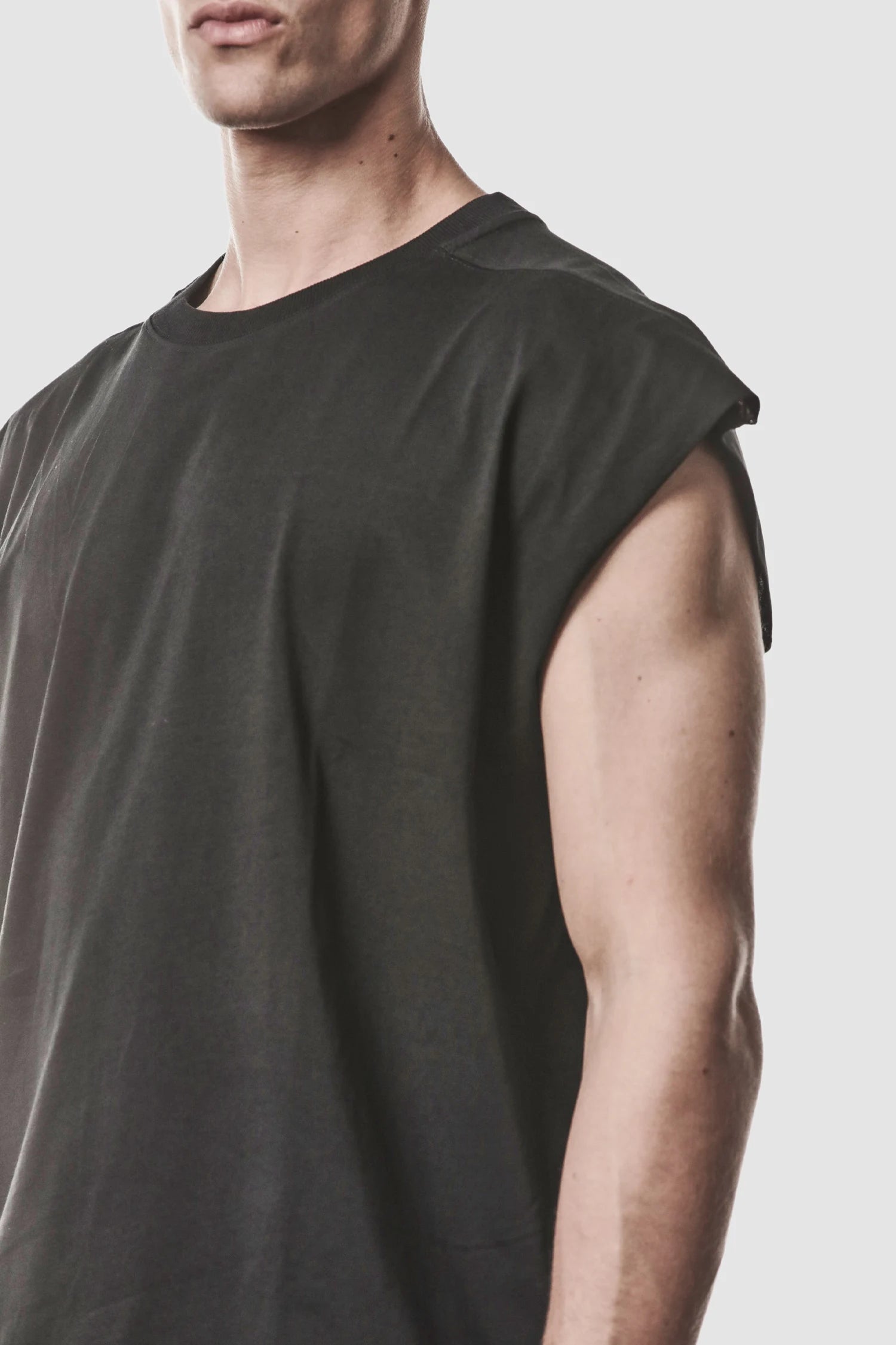 Thom Krom - model front side detail view of men’s Black Cotton Jersey Oversize Tank Top