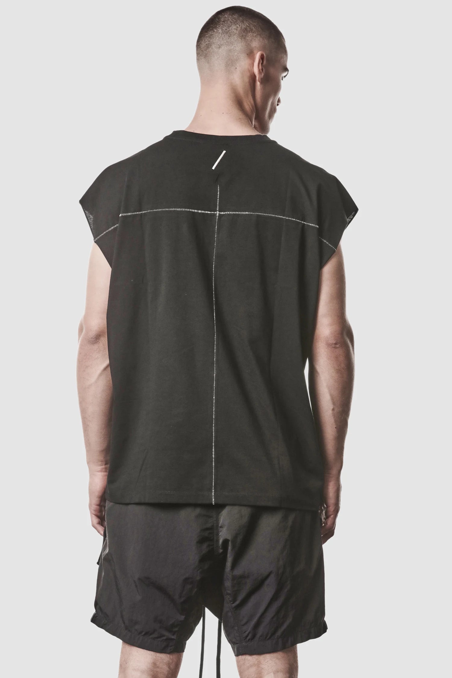 Thom Krom - model back view of men’s Black Cotton Jersey Oversize Tank Top