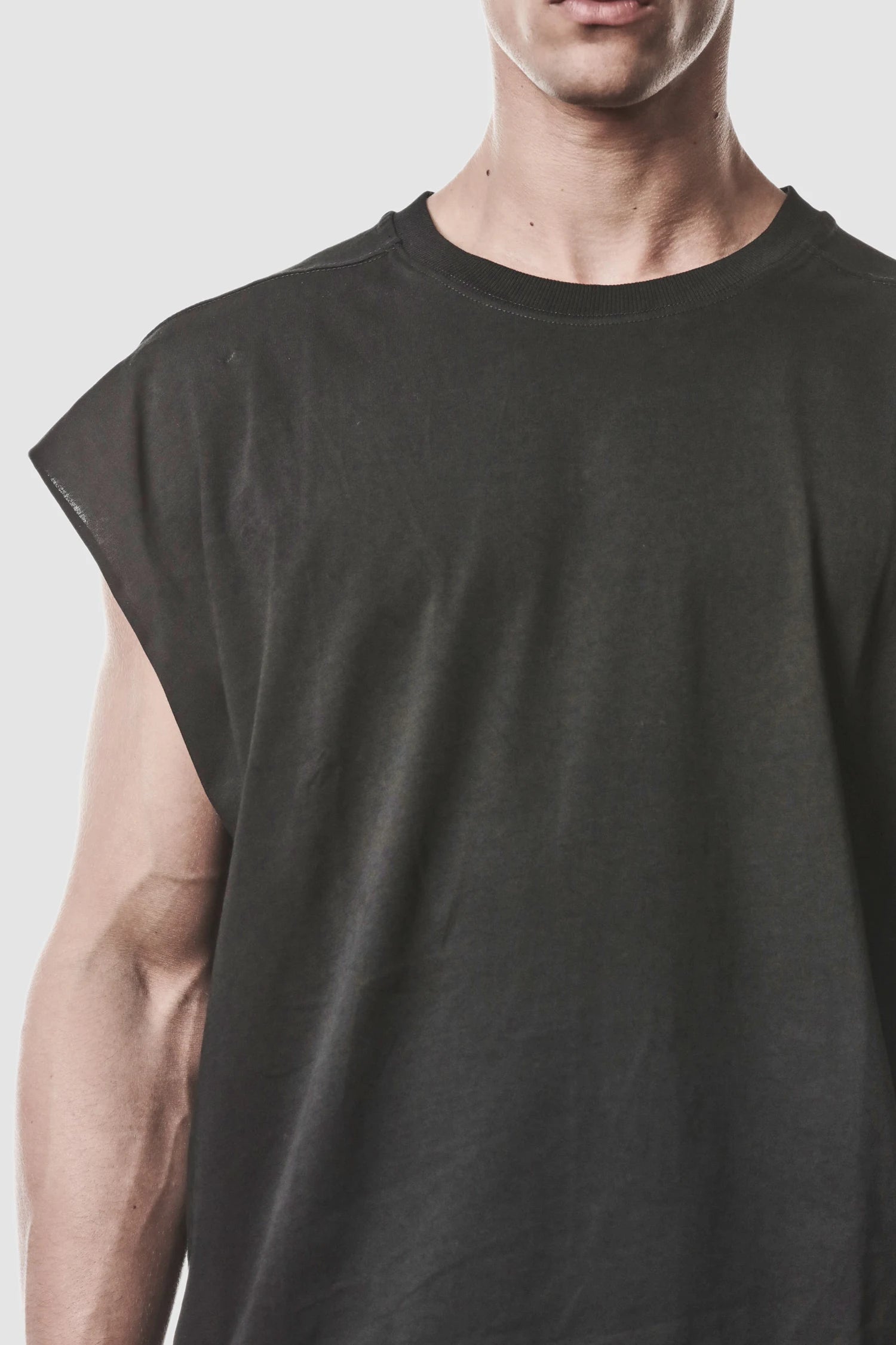 Thom Krom - model front detail view of men’s Black Cotton Jersey Oversize Tank Top