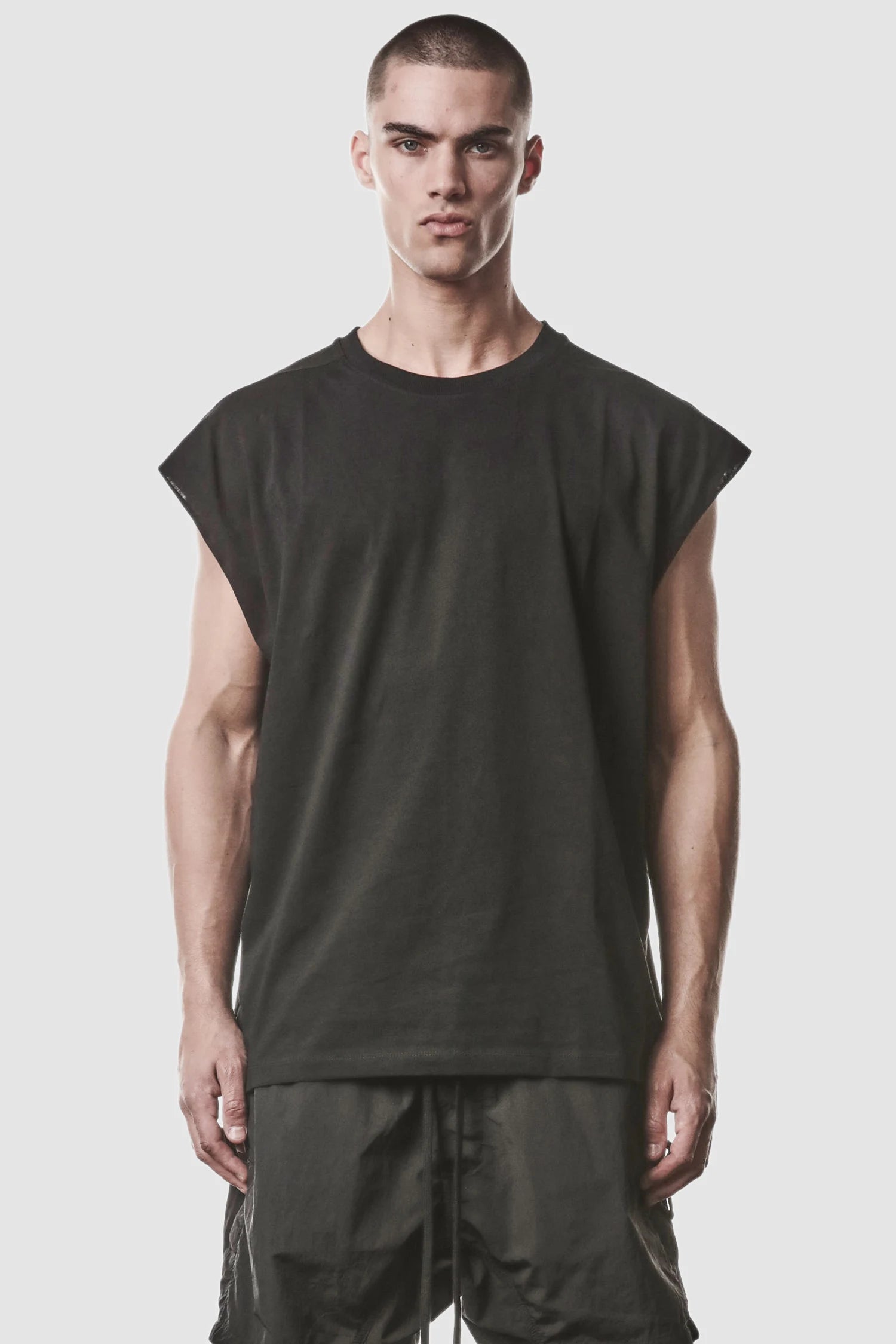 Thom Krom - model front view of men’s Black Cotton Jersey Oversize Tank Top