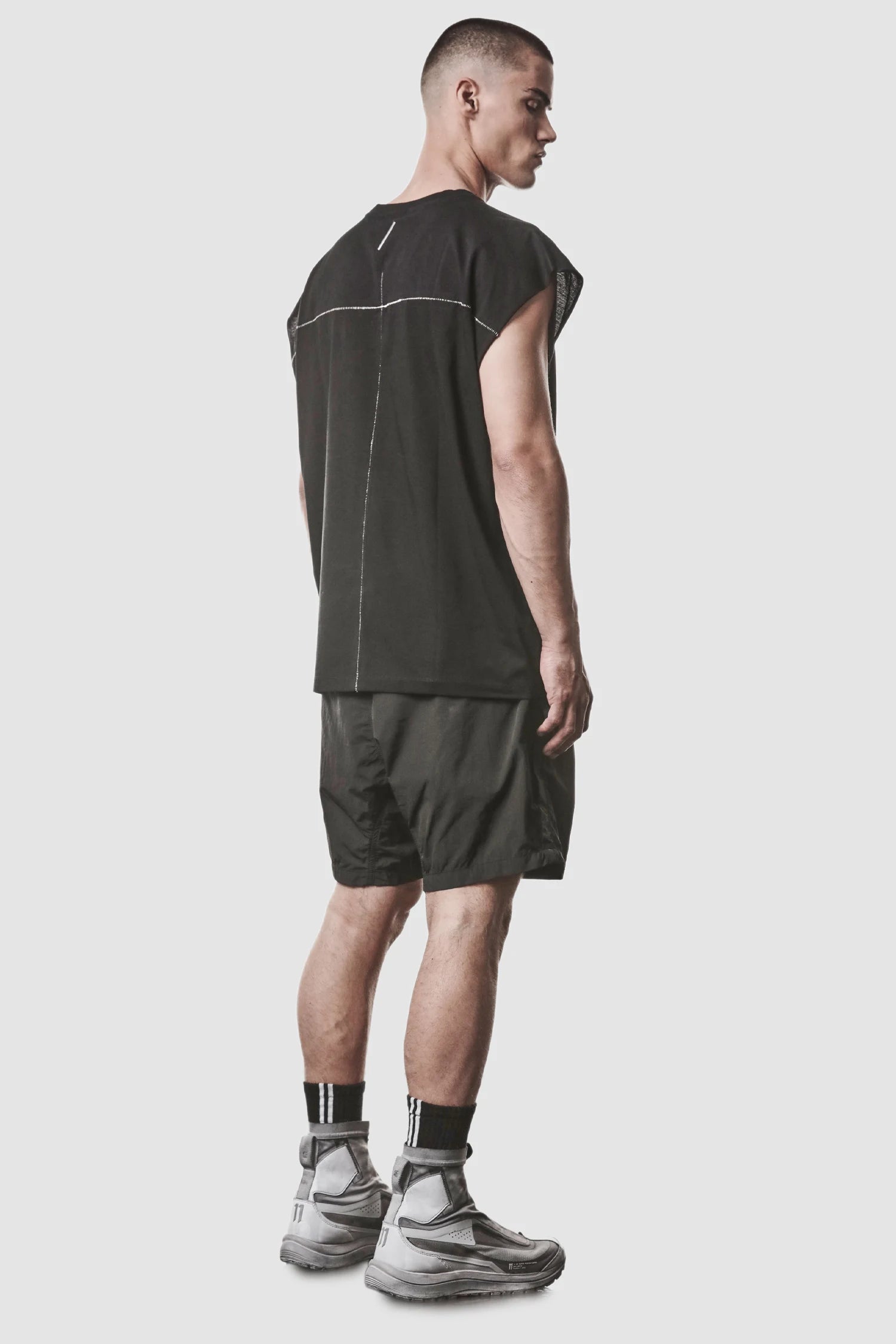 Thom Krom - model back side full view of men’s Black Cotton Jersey Oversize Tank Top