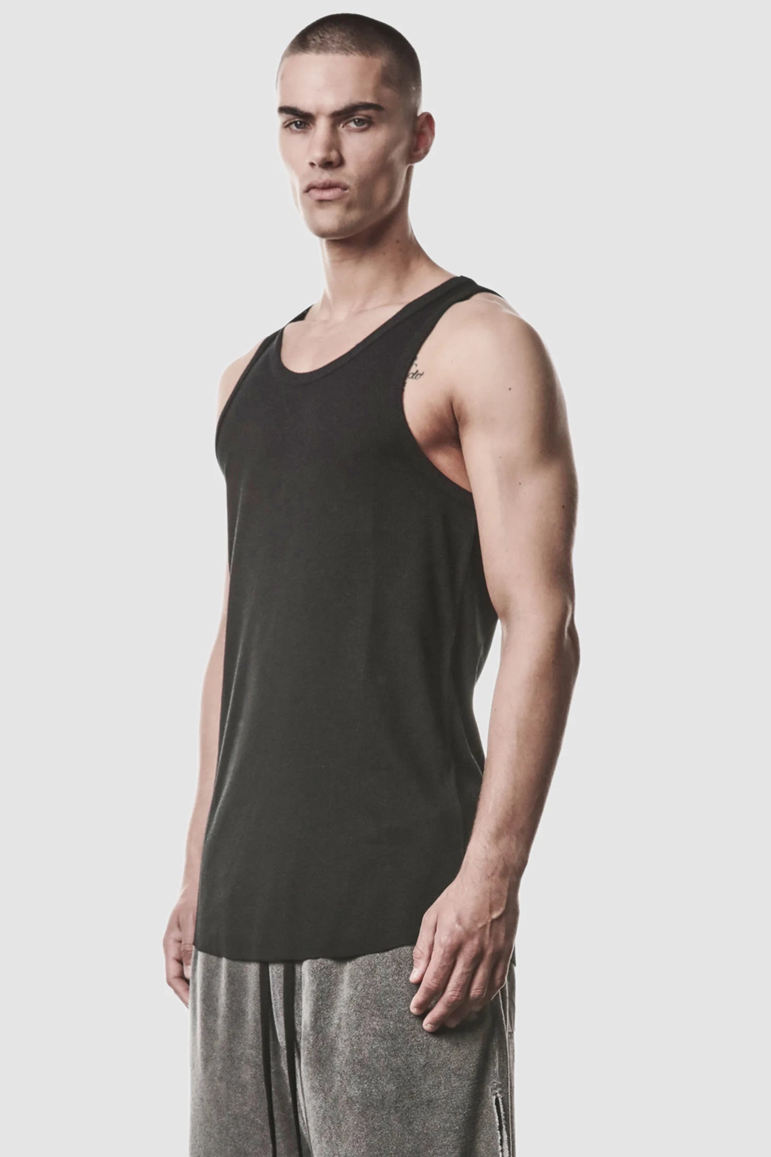 Thom Krom - model front side view of men’s Black Cotton-Linen Mix Rib Tank Top