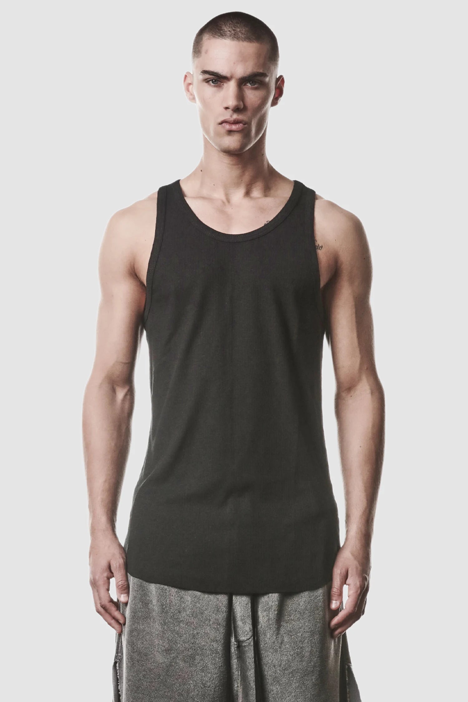 Thom Krom - model front view of men’s Black Cotton-Linen Mix Rib Tank Top