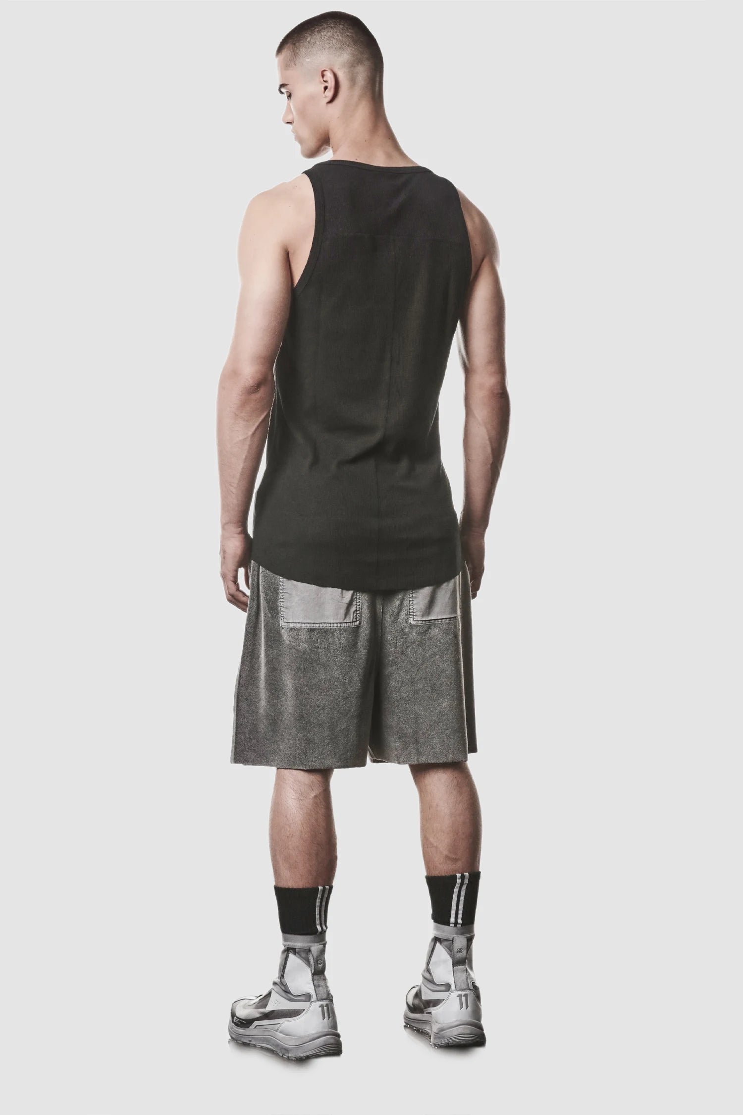 Thom Krom - model back side full view of men’s Black Cotton-Linen Mix Rib Tank Top