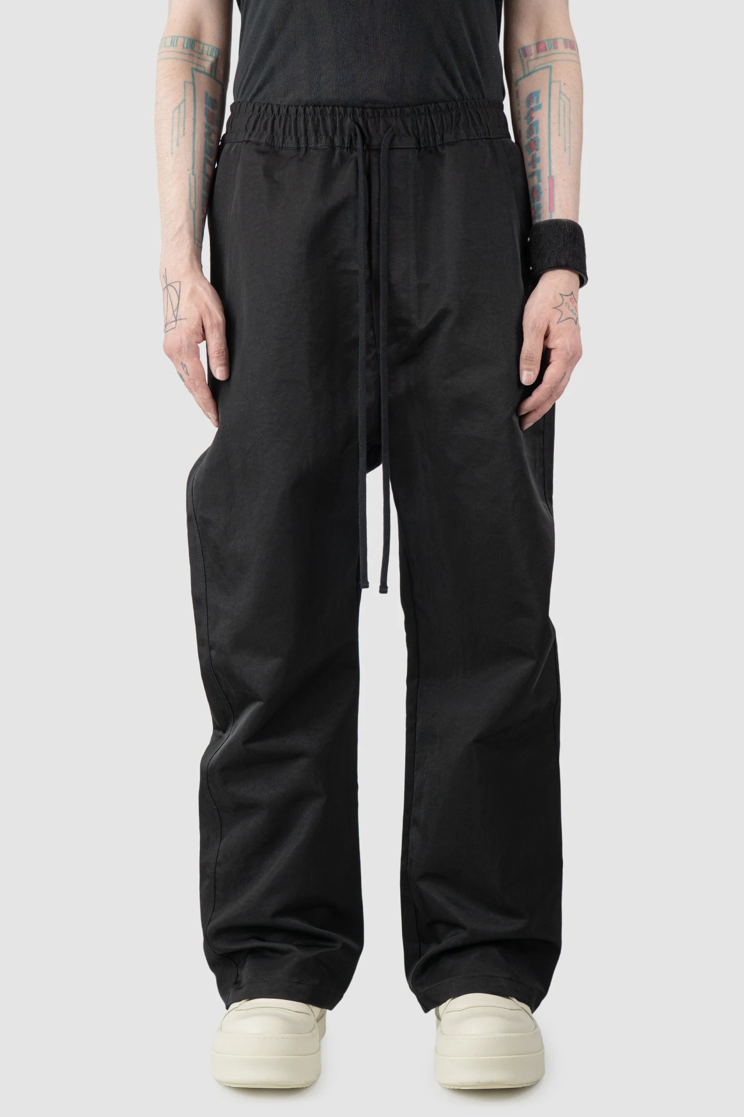 Thom Krom – Men's Black Tech Woven Wide Leg Trousers - model front view - MONO-KROM | Gallery Thom Krom – Men's Black Tech Woven Wide Leg Trousers - model front view - MONO-KROM | Gallery