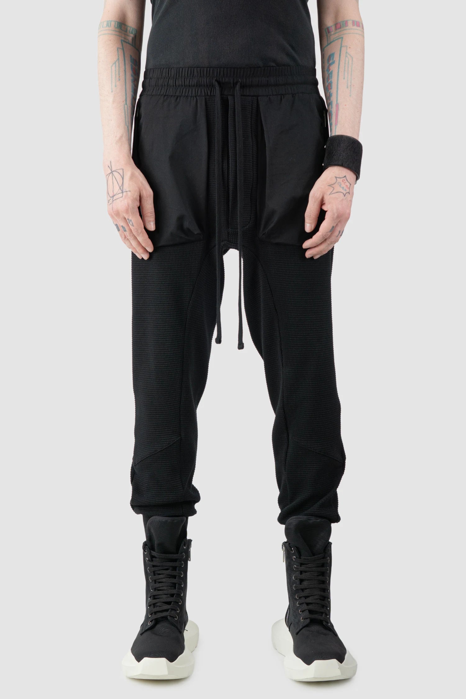 Thom Krom – Men's Black Waffle Cotton Cargo Trousers - model front view Thom Krom – Men's Black Waffle Cotton Cargo Trousers - model front view