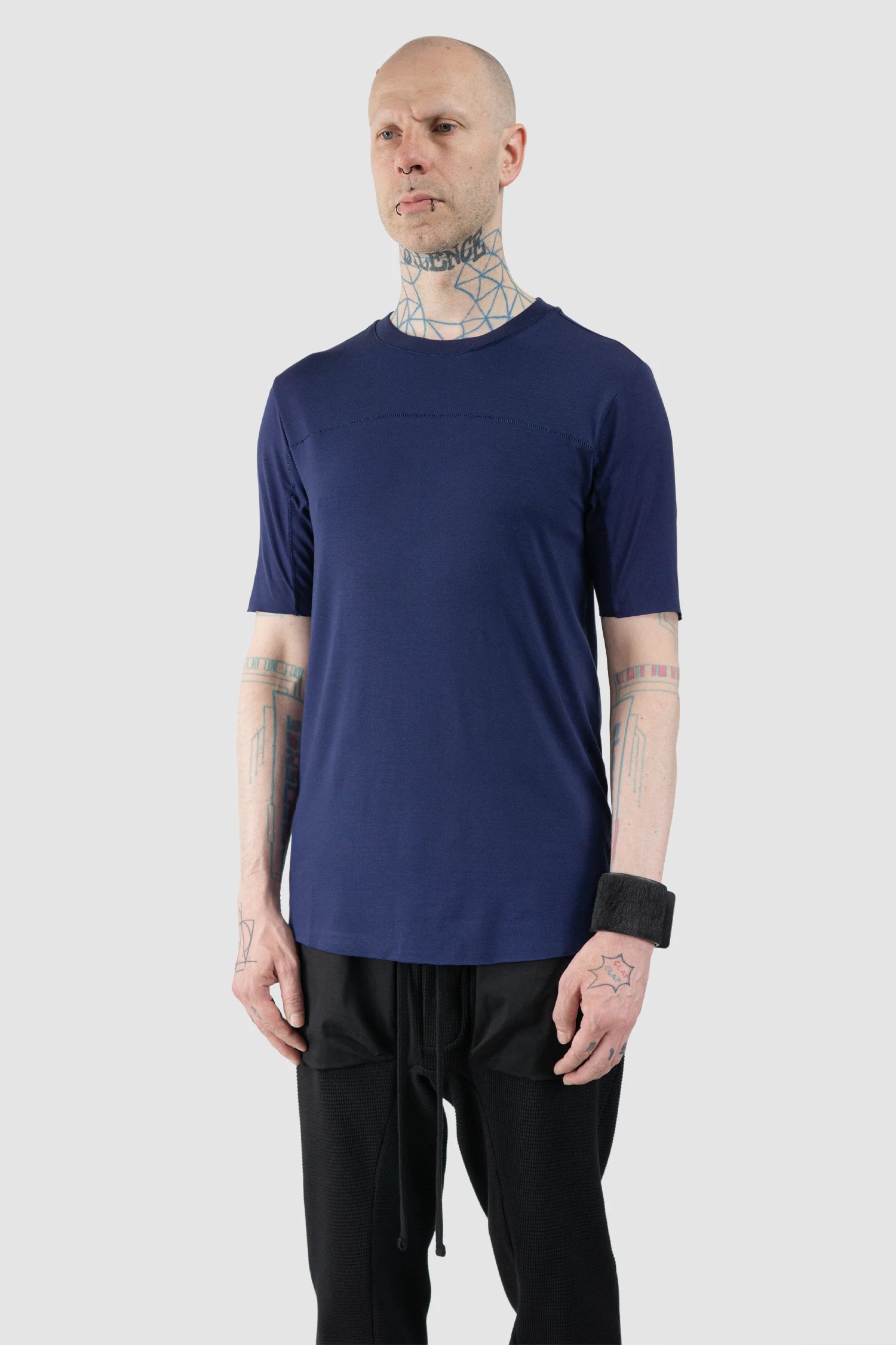 Thom Krom – Men's Blue Viscose Scar Stitch T-Shirt - model side view Thom Krom – Men's Blue Viscose Scar Stitch T-Shirt - model side view