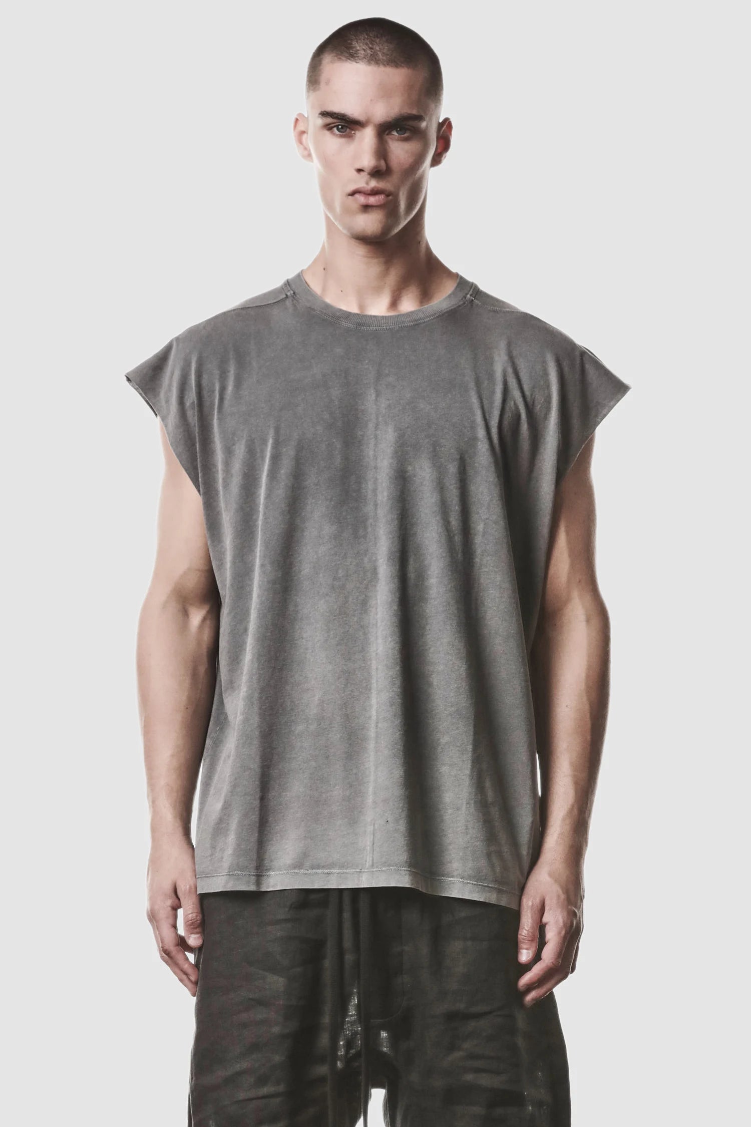 Thom Krom - model front view of men’s Grey Oversized Round Neck Tank Top