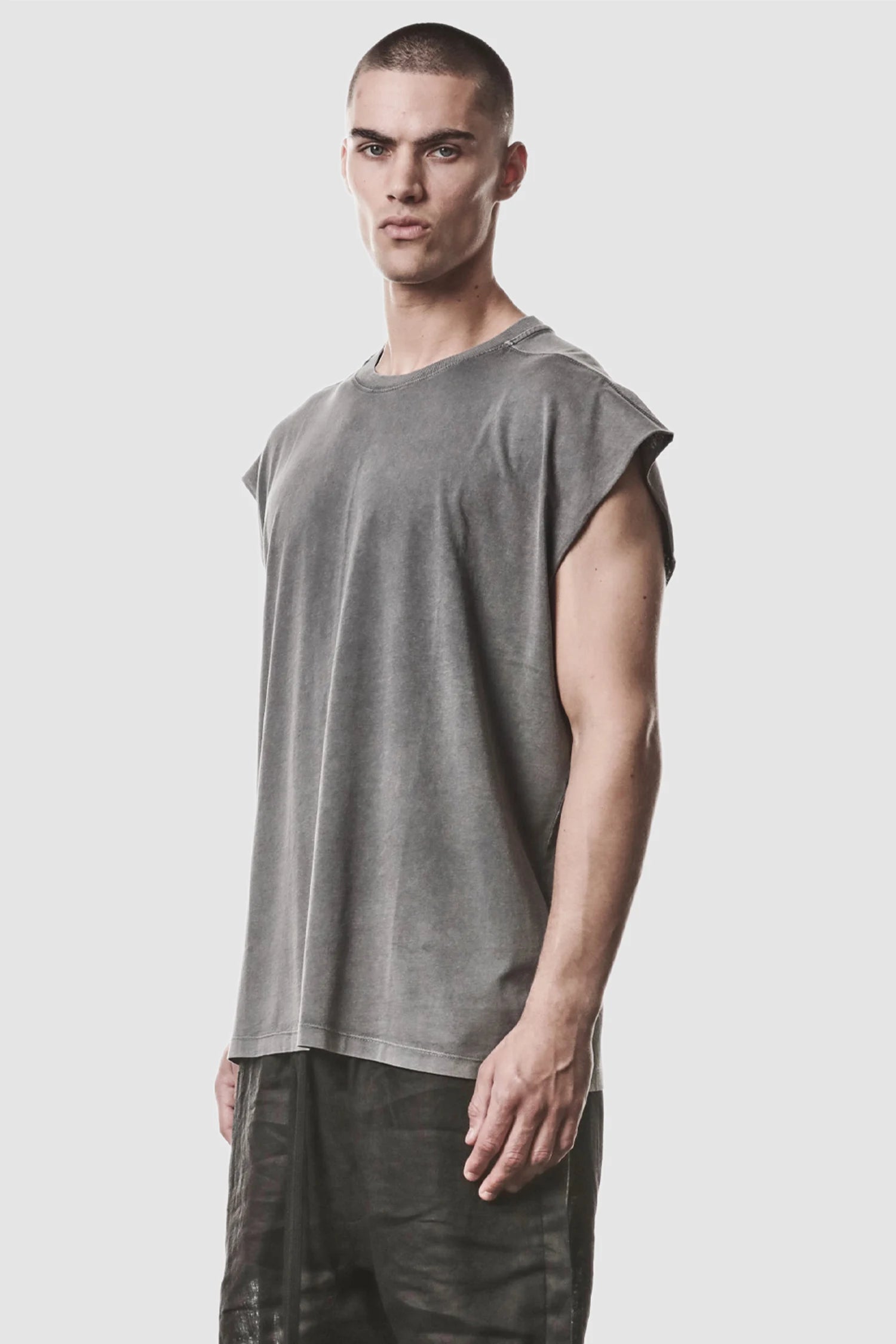 Thom Krom - model front side view of men’s Grey Oversized Round Neck Tank Top