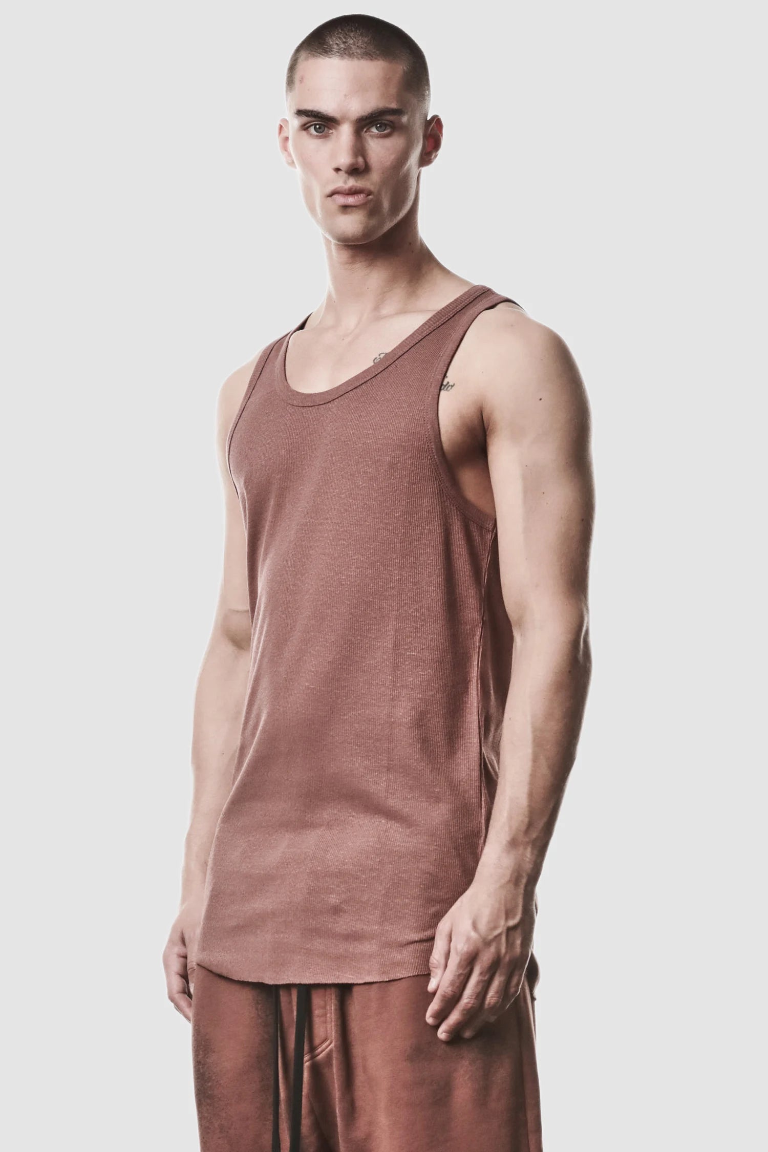 Thom Krom - model front side view of men’s Red Cotton-Linen Rib Singlet Tank Top