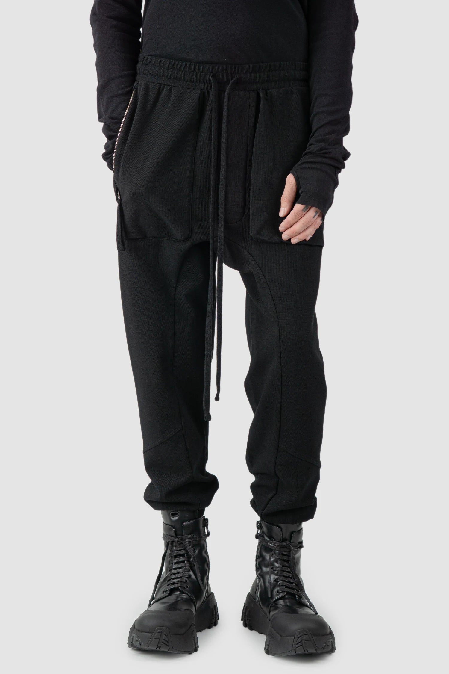 Thom Krom - model front relaxed view of black Relaxed Fit Cotton Cargo Trousers with Zip Pockets - M-ST-509