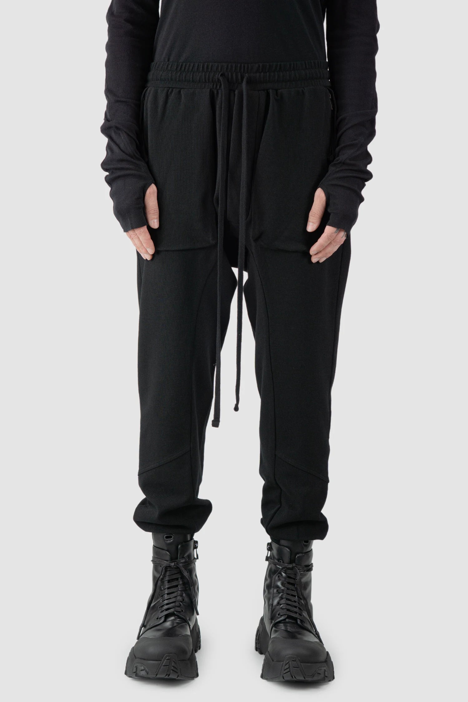 Thom Krom - model front view of black Relaxed Fit Cotton Cargo Trousers with Zip Pockets - M-ST-509