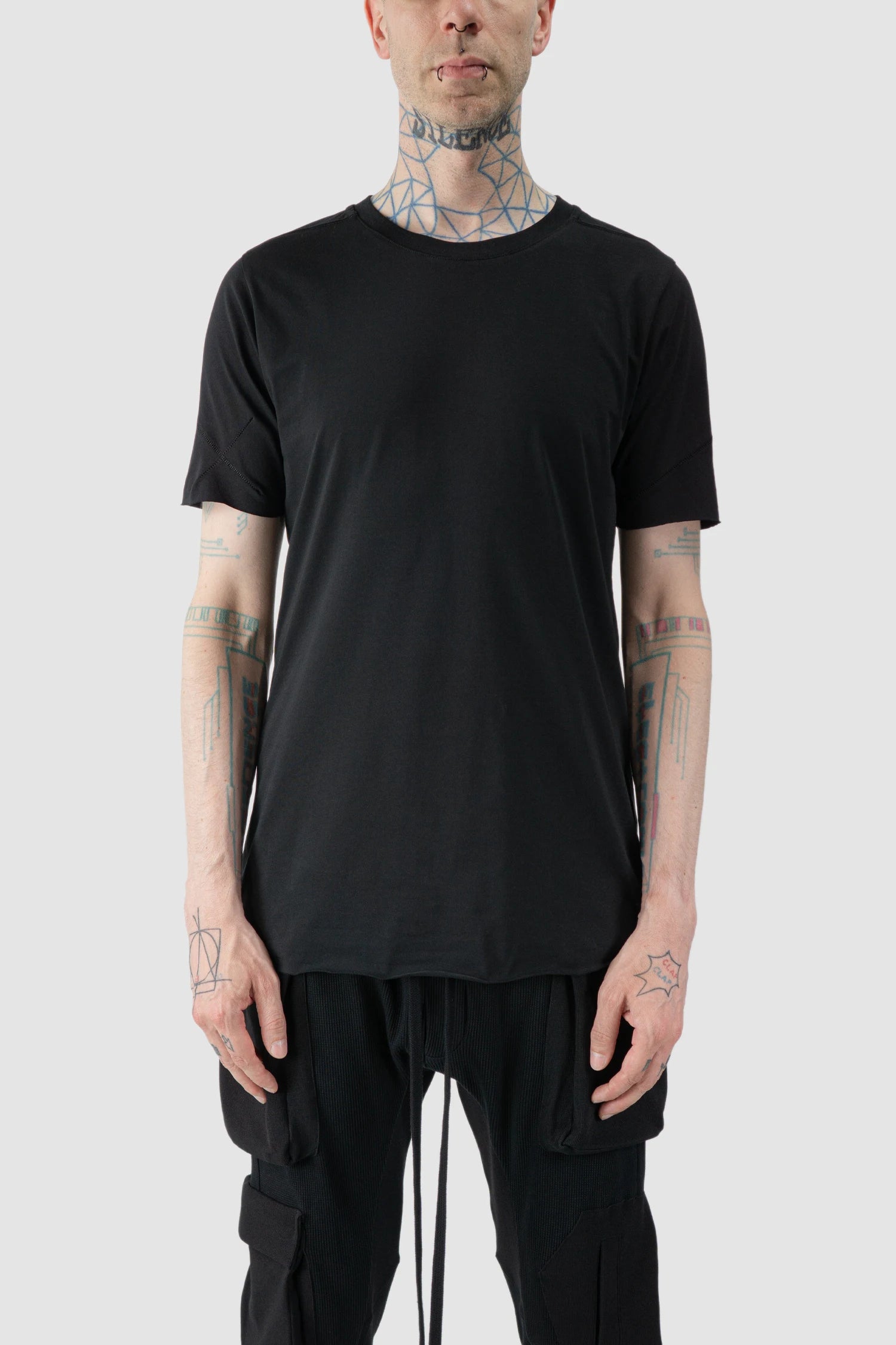 Thom Krom - model front view of black Slim Fit Raw Hem Cotton T-Shirt - M-TS-872