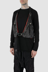 0.Hide - front side view of vegetable tanned black and red horsehide leather cargo vest from the permanent collection with two types of horse leather shoulder panels, adjustable cotton straps and zippered pockets.
