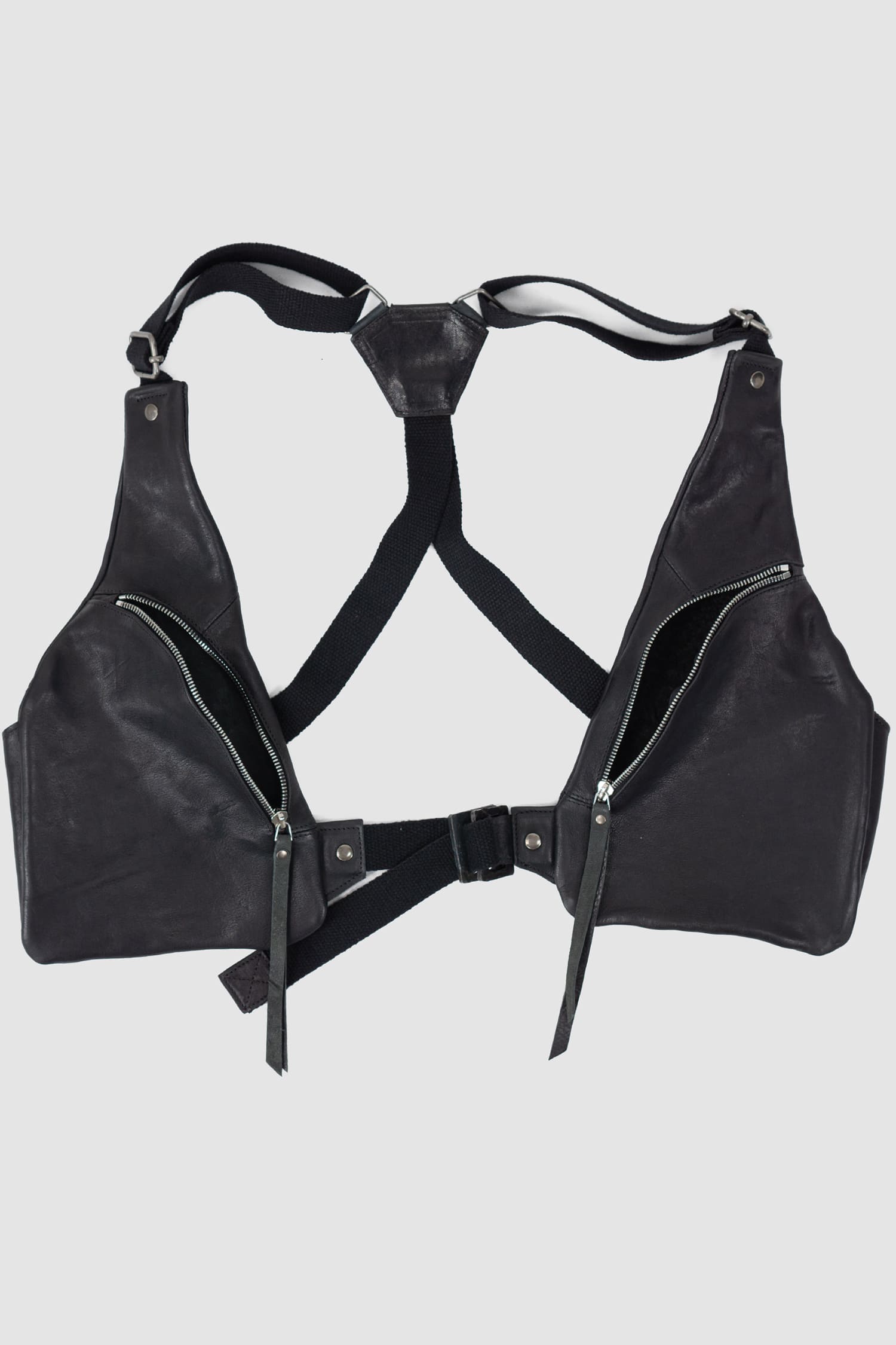 0.Hide - front open view of the black Horse Leather Cargo Vest Bag from the Permanent Collection.
