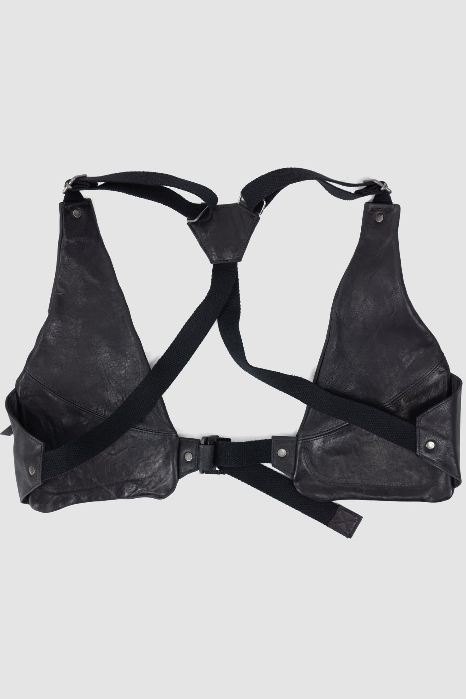 0.Hide - back view of the black Horse Leather Cargo Vest Bag from the Permanent Collection.