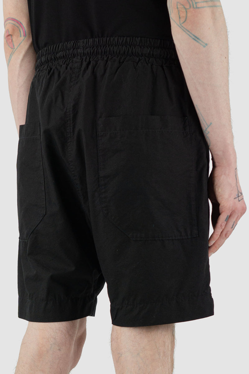 Detail view of Black Light Field Shorts for Men with elastic waistband, SS24, NOMEN NESCIO