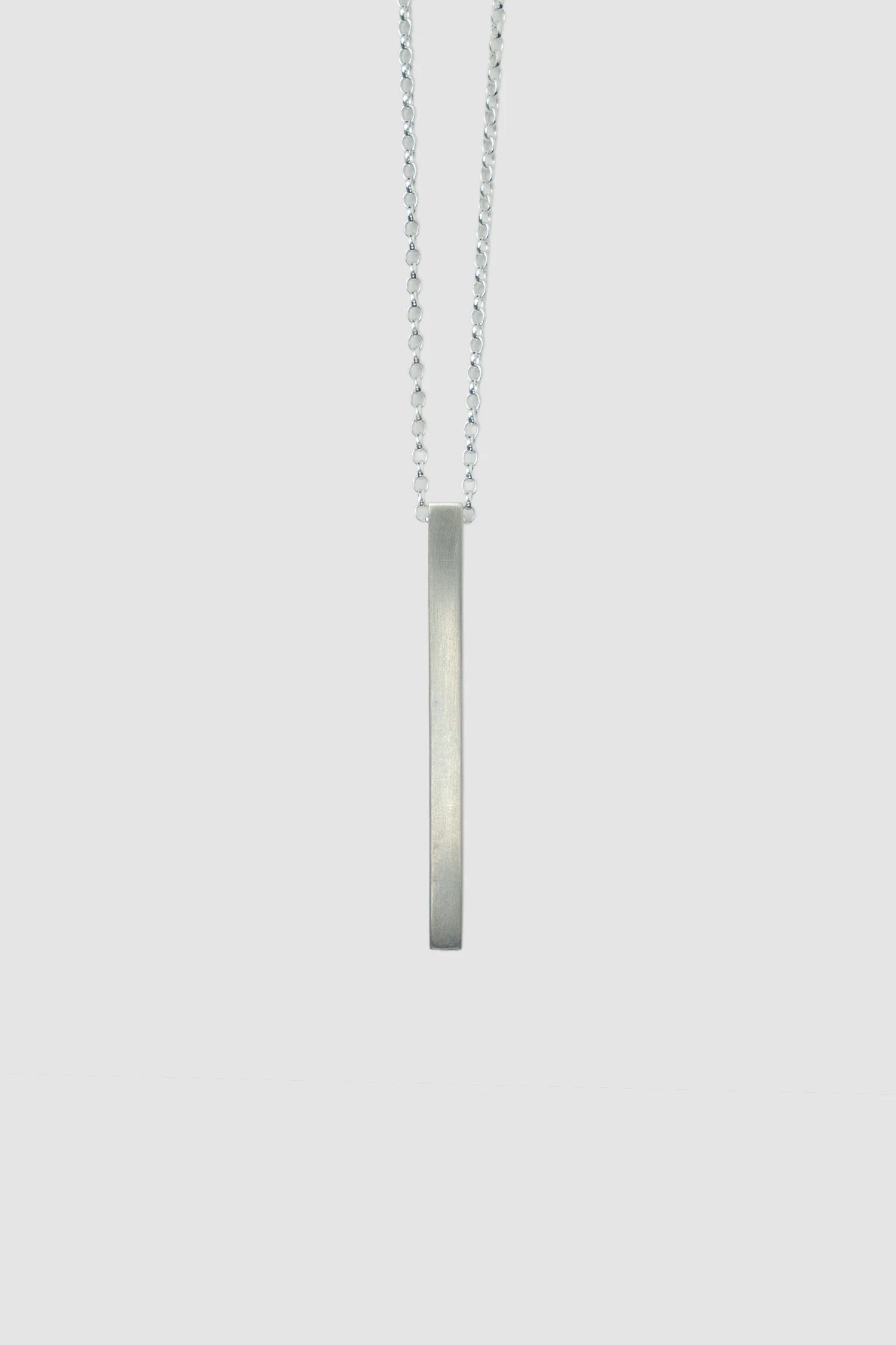 2819 Jewelry - Matte Brushed Sterling Silver Line Pendant item close up view