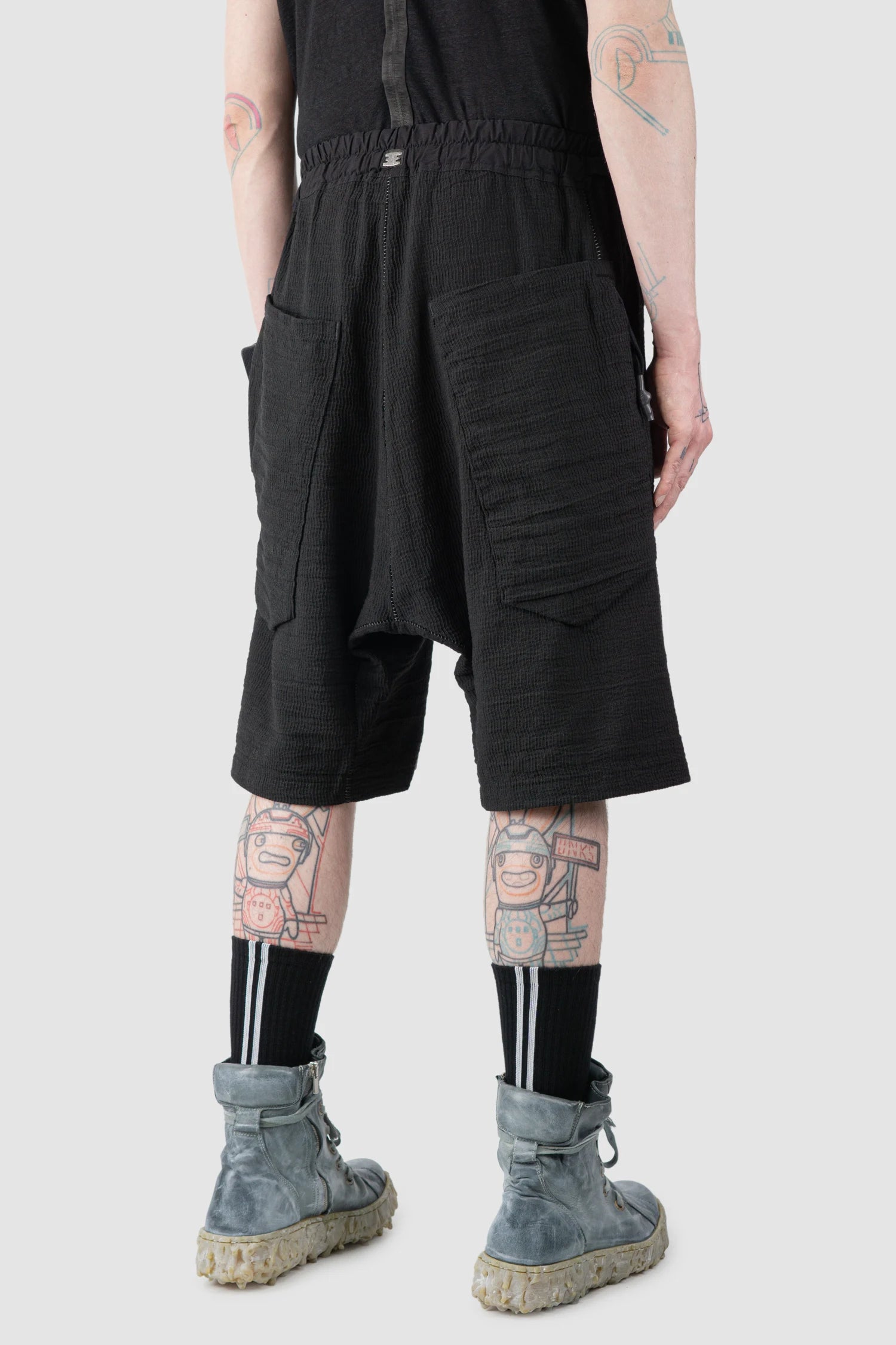 69 by Isaac Sellam - Men’s Black Drop Crotch Hidden Pocket Cotton Shorts model back side view