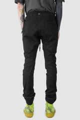 69 by Isaac Sellam - model back view of Black Fitted Cotton Cargo Trousers
