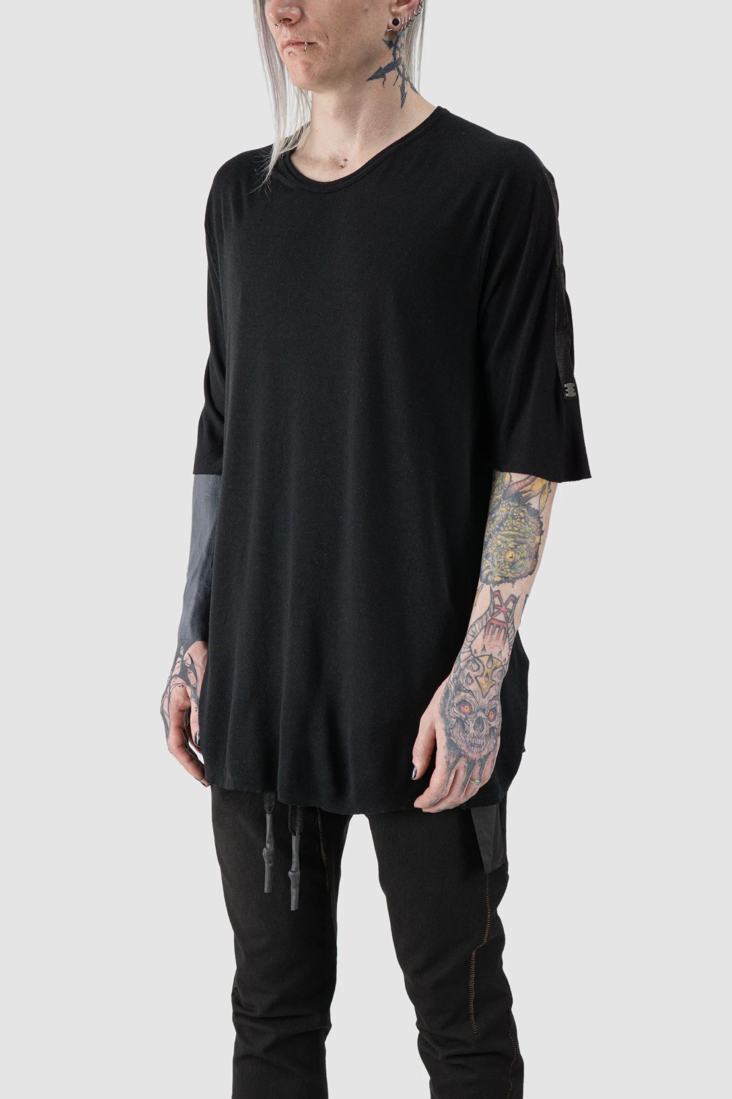 69 by Isaac Sellam - model front side view of Black Horizontal Leather Spine Cashmere Blend T-Shirt