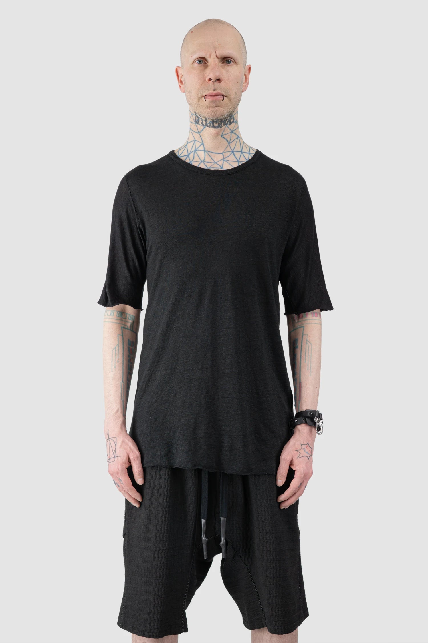 69 by Isaac Sellam - Men’s Black Linen T-Shirt with Horizontal Leather Detail model front view