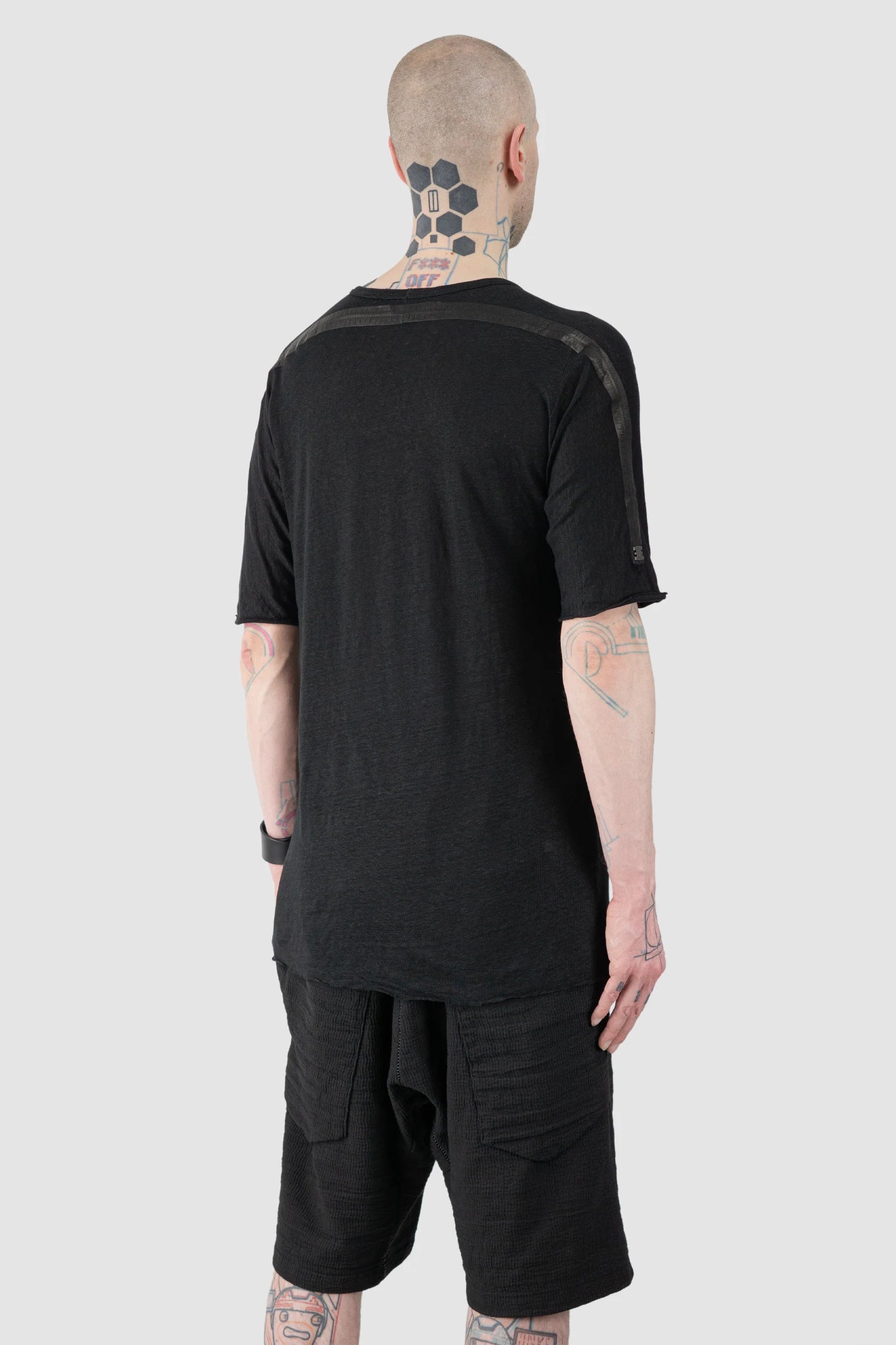 69 by Isaac Sellam - Men’s Black Linen T-Shirt with Horizontal Leather Detail model back side view
