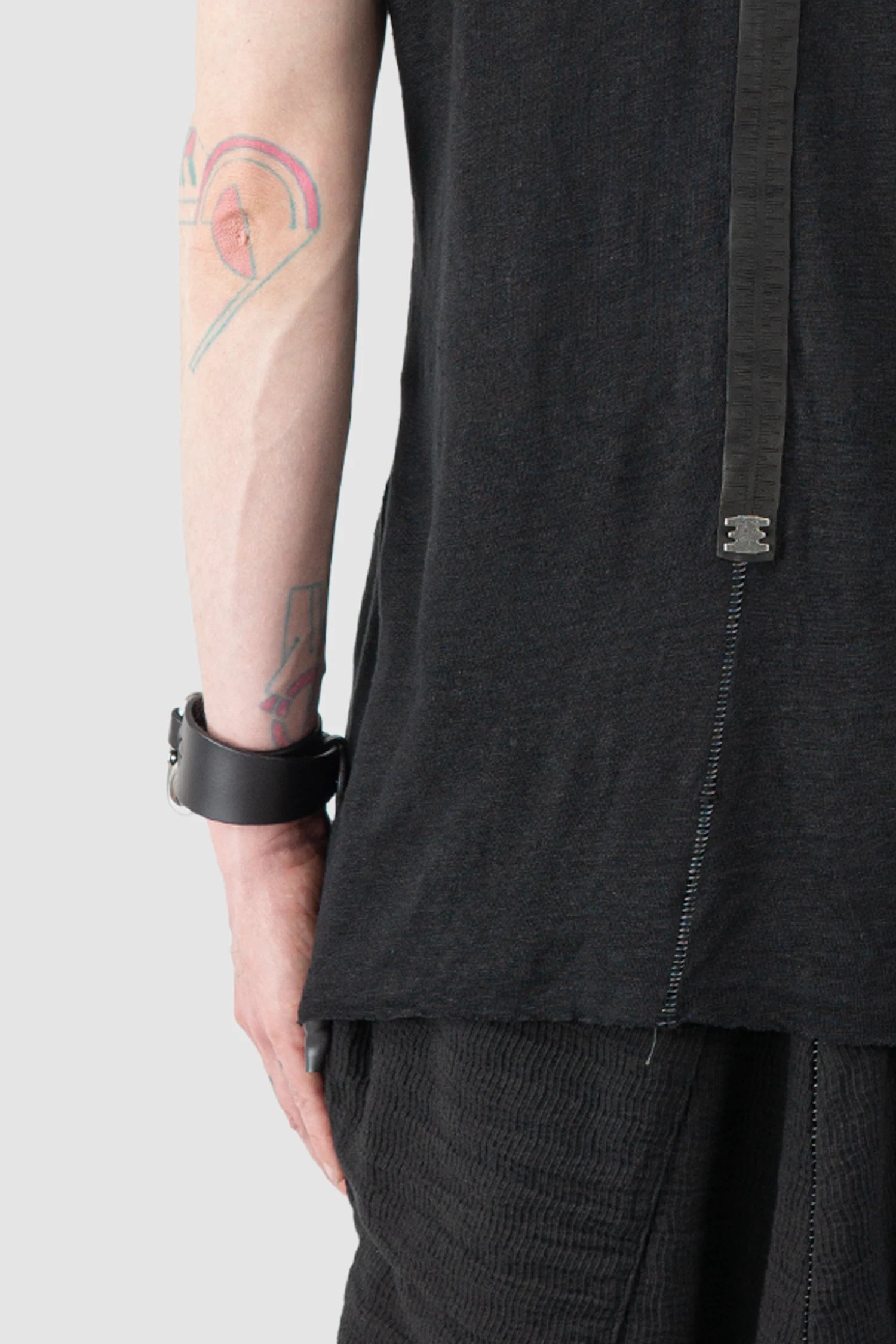 69 by Isaac Sellam - Men’s Black Linen Tank Top with Leather Spine Detail back hem view