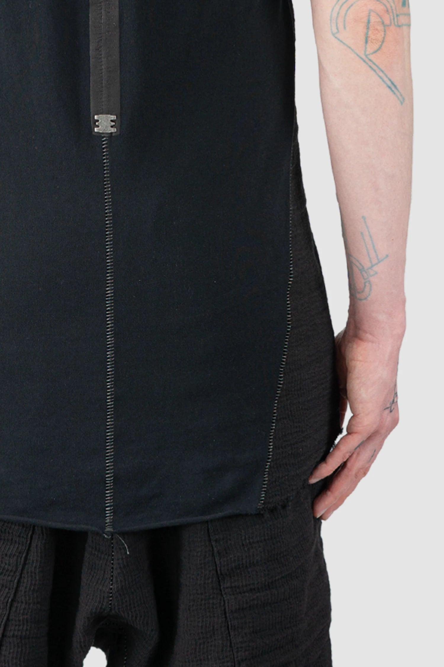69 by Isaac Sellam - Men’s Black Mixed Structure Cotton T Shirt with Leather Spine hem close up view