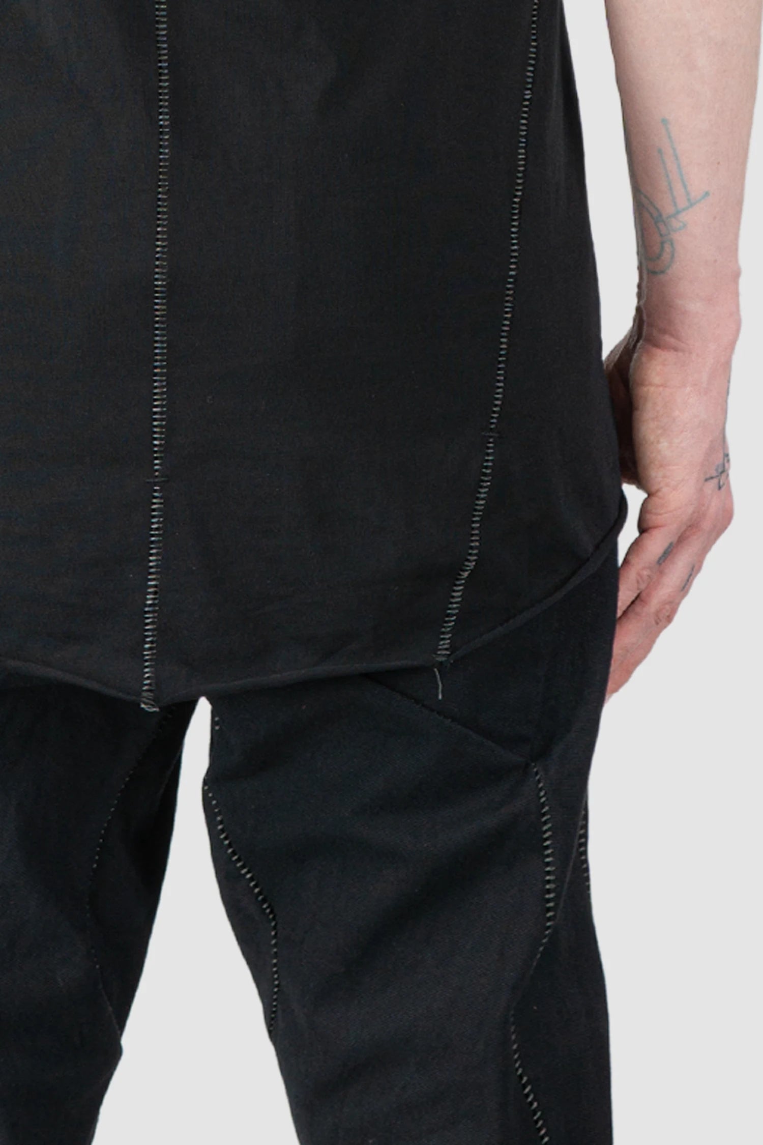 69 by Isaac Sellam - Men’s Black Organic Cotton Raglan T-Shirt hem detail view