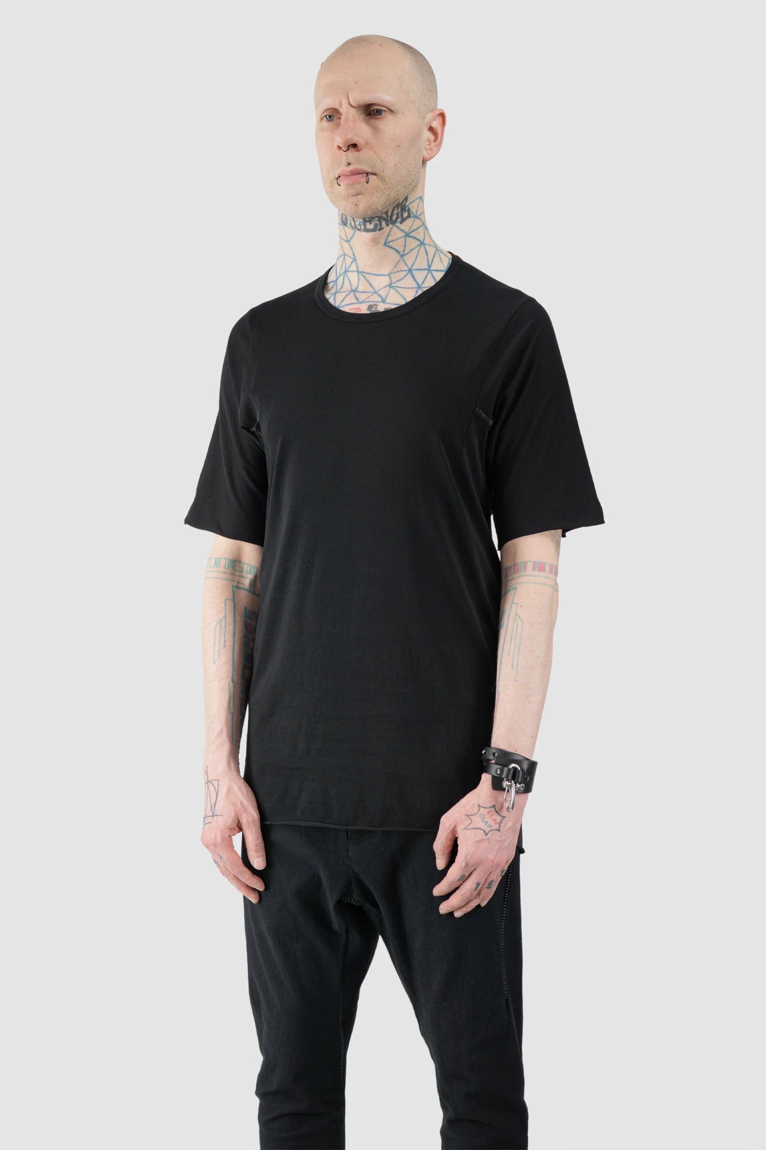 69 by Isaac Sellam - Men’s Black Organic Cotton Raglan T-Shirt model side view