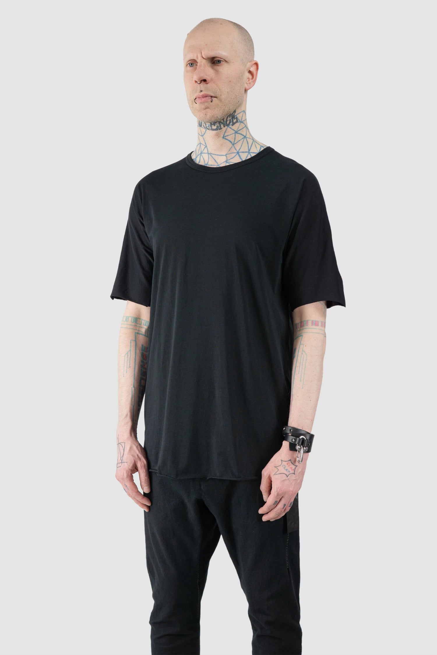 69 by Isaac Sellam - Men’s Black Organic Cotton T-Shirt with Leather Details model side view