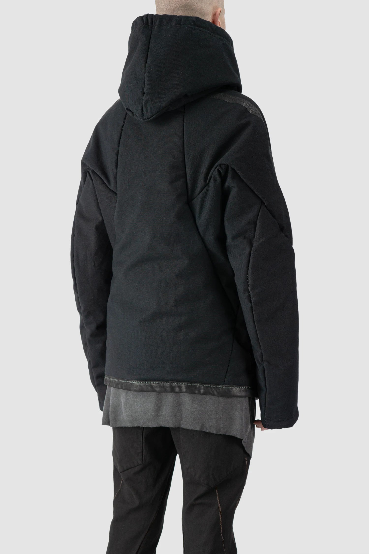 69 by Isaac Sellam - model back side view of men’s Black Padded Cotton Jacket with Hood
