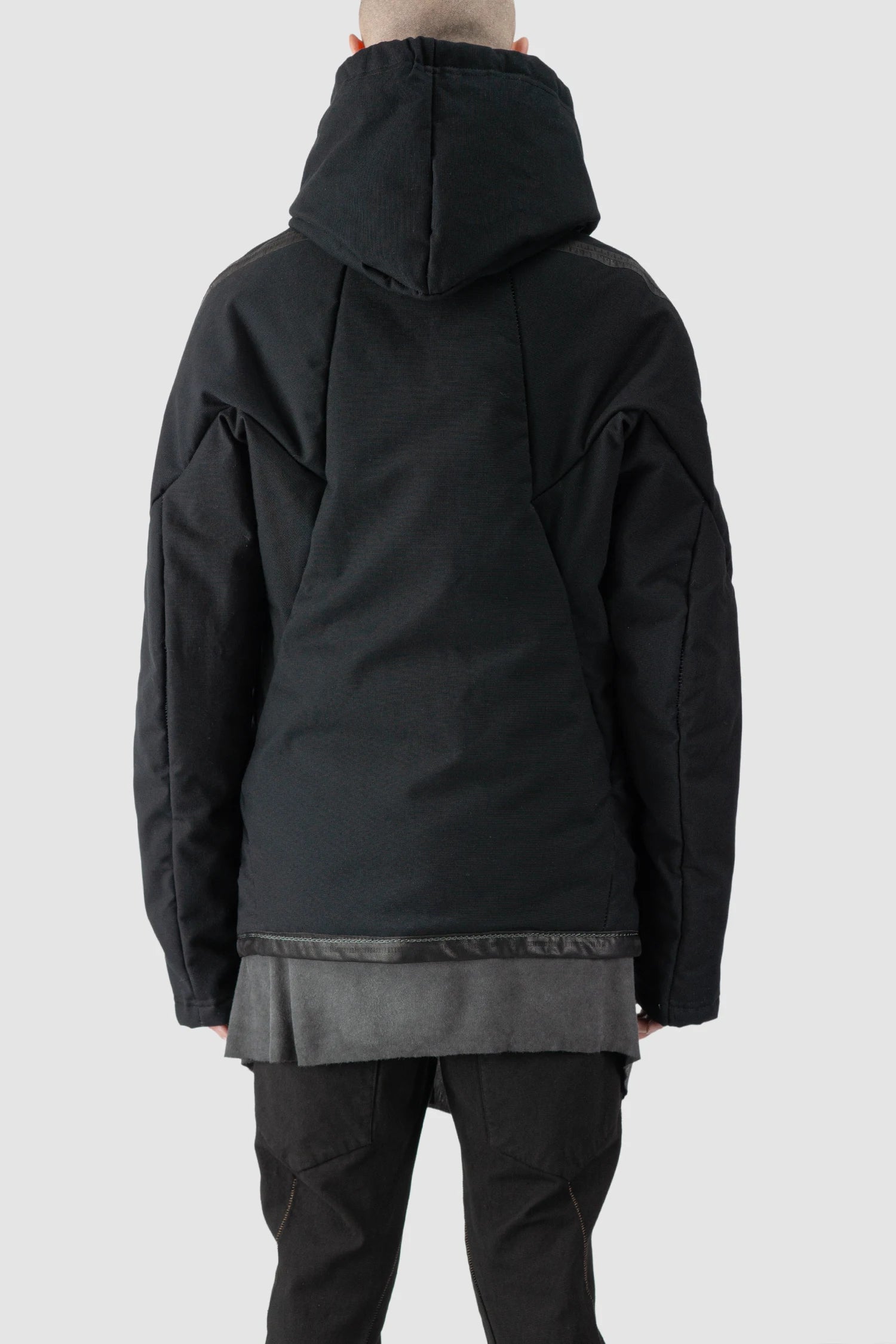 69 by Isaac Sellam - model back view of men’s Black Padded Cotton Jacket with Hood