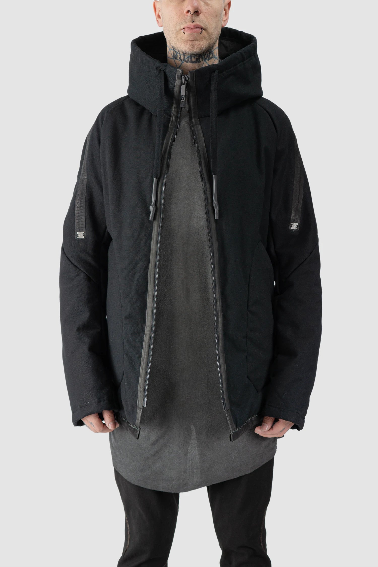 69 by Isaac Sellam - model front half open view of men’s Black Padded Cotton Jacket with Hood
