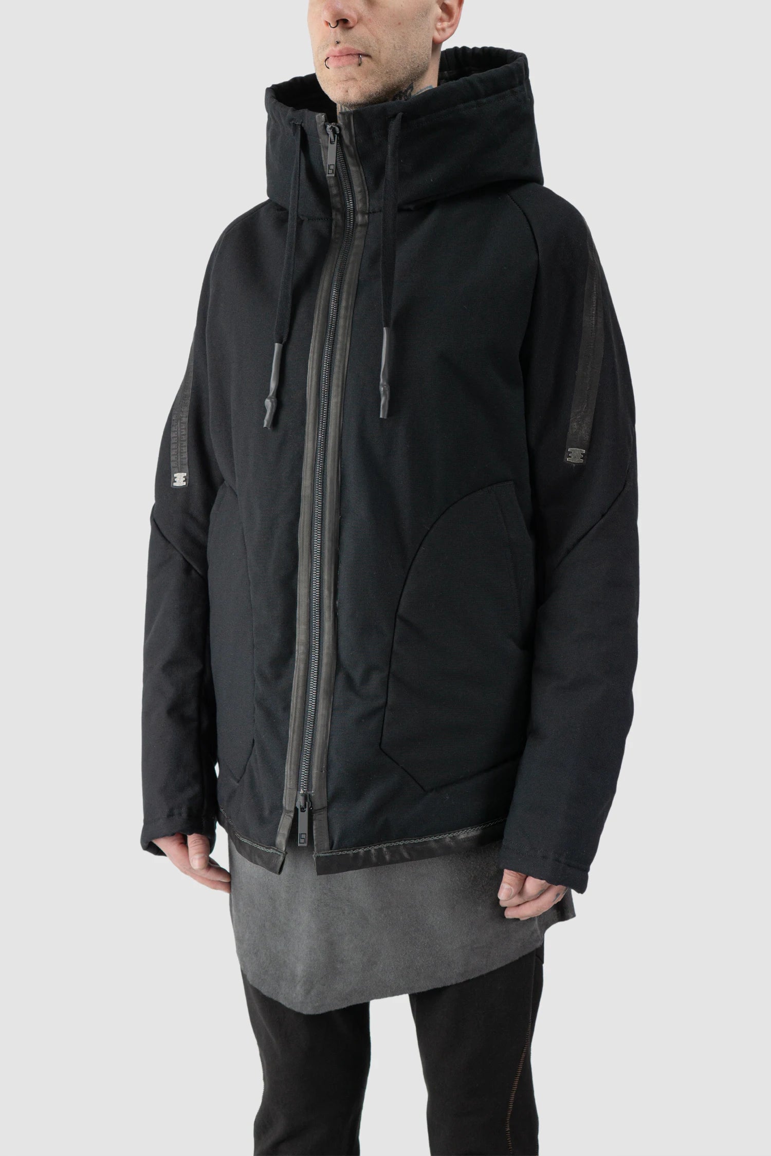 69 by Isaac Sellam - model front side view of men’s Black Padded Cotton Jacket with Hood