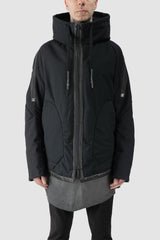 69 by Isaac Sellam - model front view of men’s Black Padded Cotton Jacket with Hood