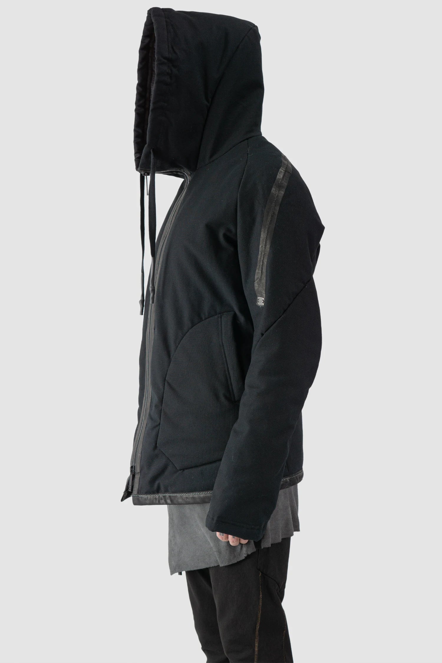 69 by Isaac Sellam - model hooded view of men’s Black Padded Cotton Jacket with Hood