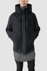 69 by Isaac Sellam - model front relaxed view of men’s Black Padded Cotton Jacket with Hood