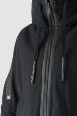 69 by Isaac Sellam - model front zipper detail view of men’s Black Padded Cotton Jacket with Hood