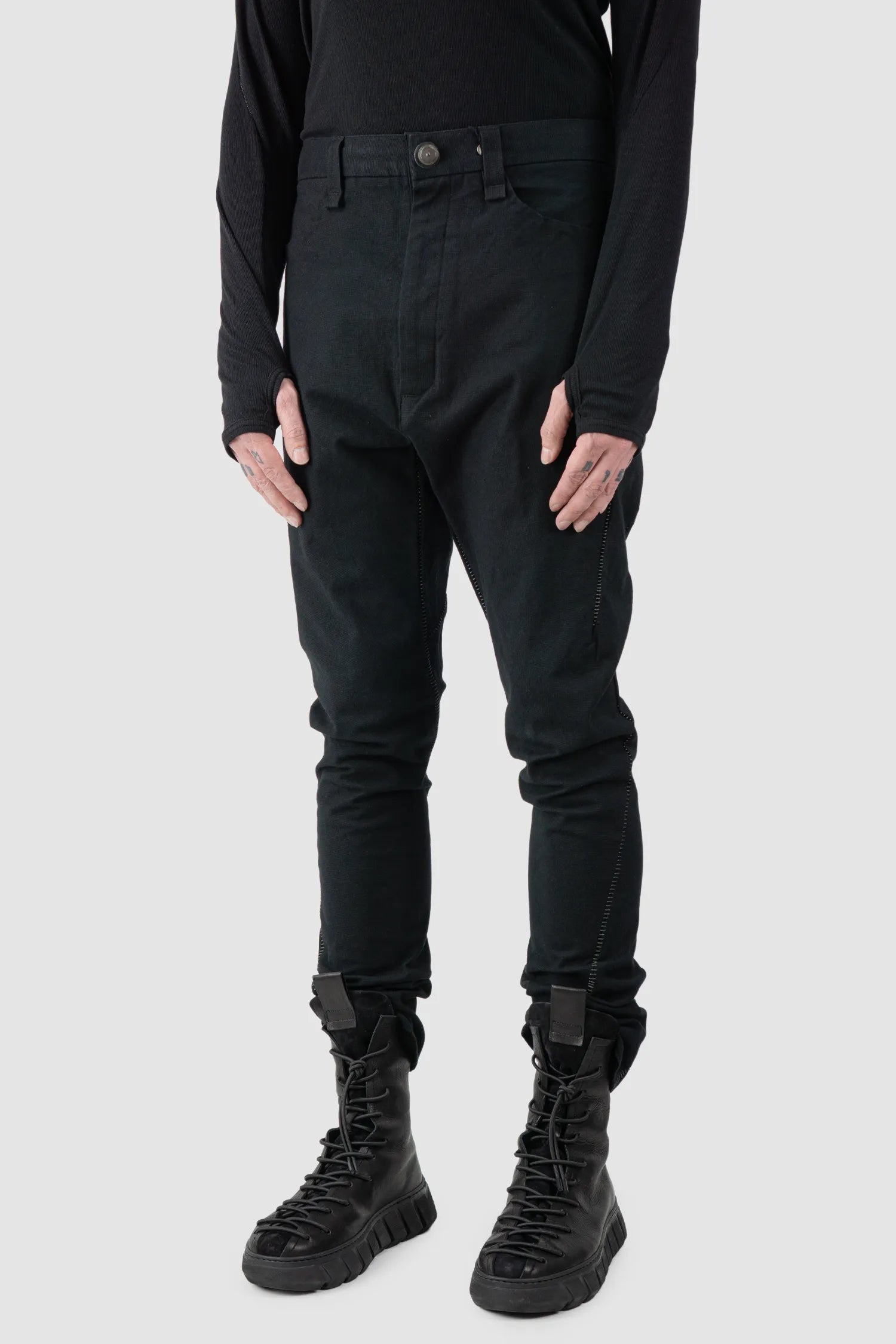 69 by Isaac Sellam - Men's Black Structured French Cotton Trousers - model front side view - MONO-KROM | Gallery