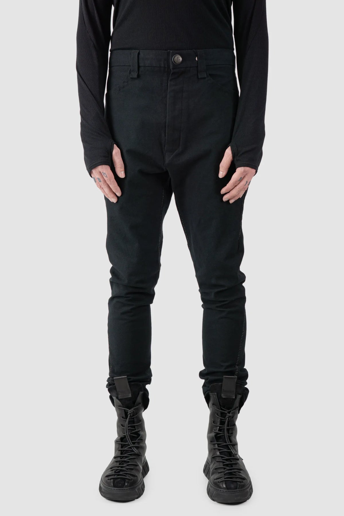 69 by Isaac Sellam - Men's Black Structured French Cotton Trousers - model front view - MONO-KROM | Gallery