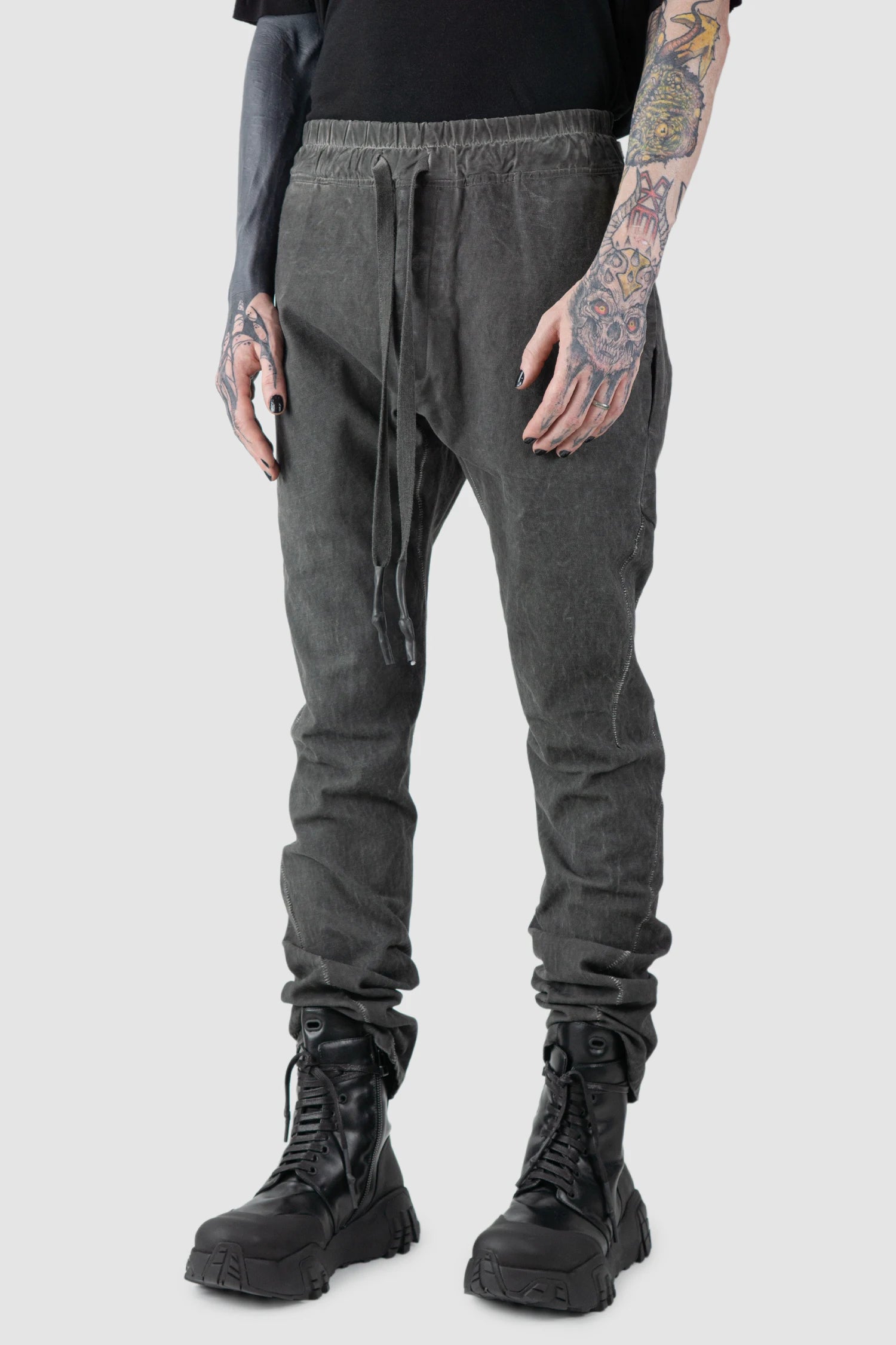 69 by Isaac Sellam - model side view of Grey 6 Pocket Garment-Dyed Cotton Cargo Pants