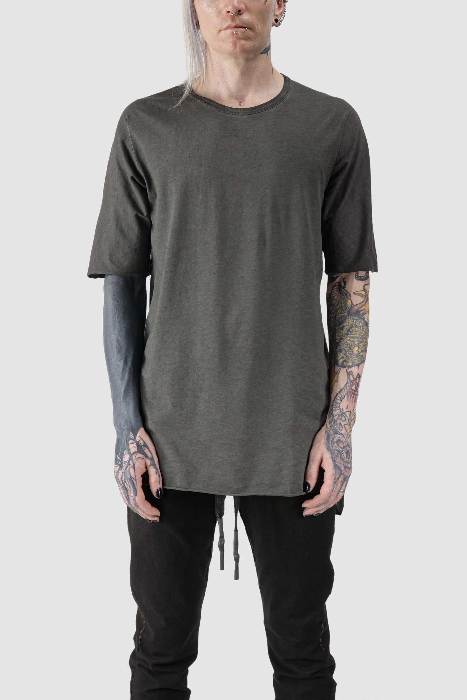 69 by Isaac Sellam - model front view of Grey Object Dyed Leather Spine Short Sleeve Tee