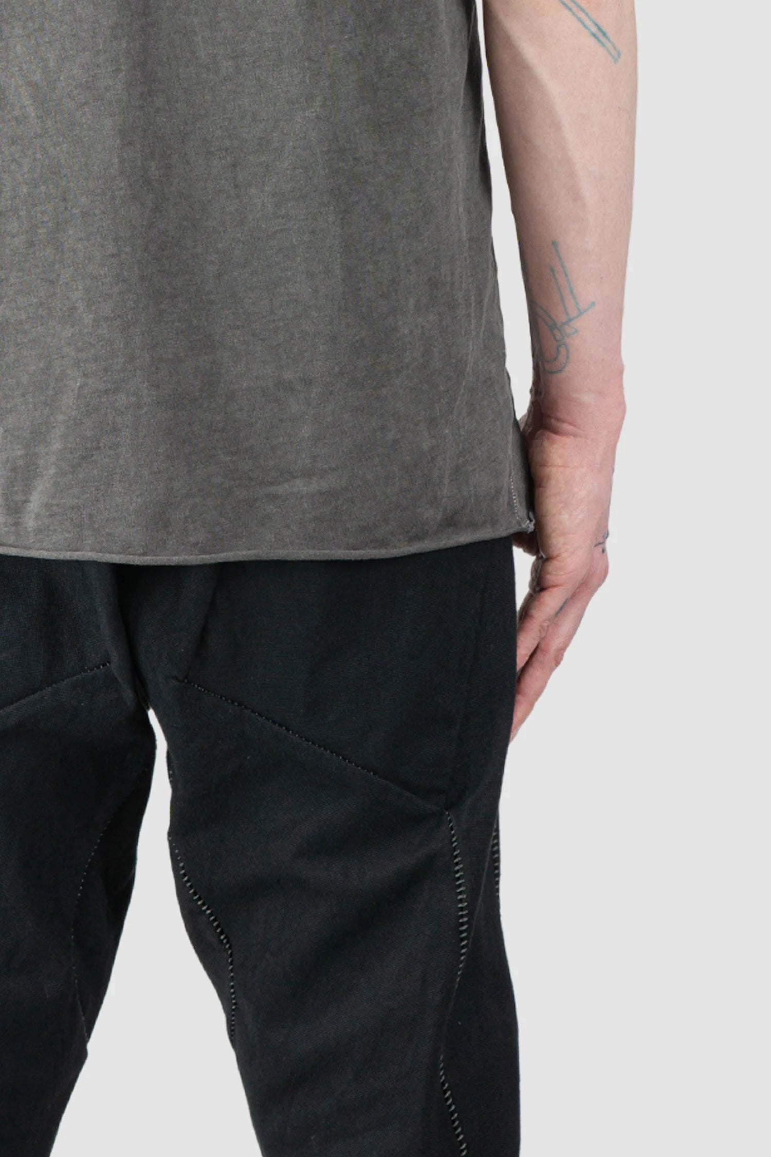 69 by Isaac Sellam - Men’s Grey Object Dyed Leather Spine Short Sleeve Tee hem detail view