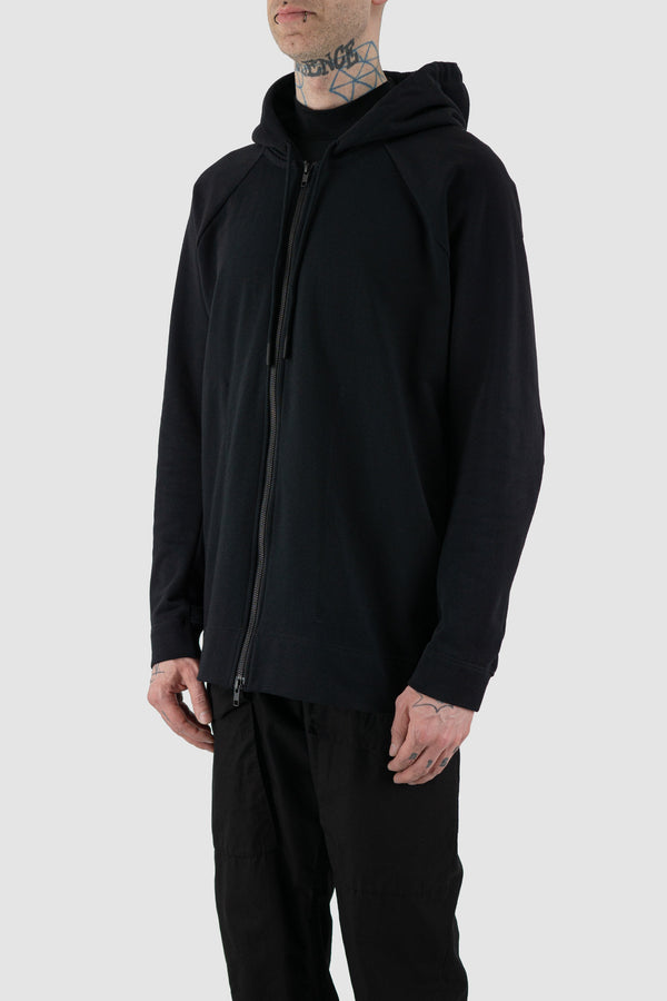 Embrace eco-conscious style with the NOMEN NESCIO black raglan zip hoodie from the SS24 collection. Crafted from 100% organic cotton knitted in Finland, it features comfortable raglan sleeves, a classic round wool rib neckline, and a relaxed fit for a timeless look.