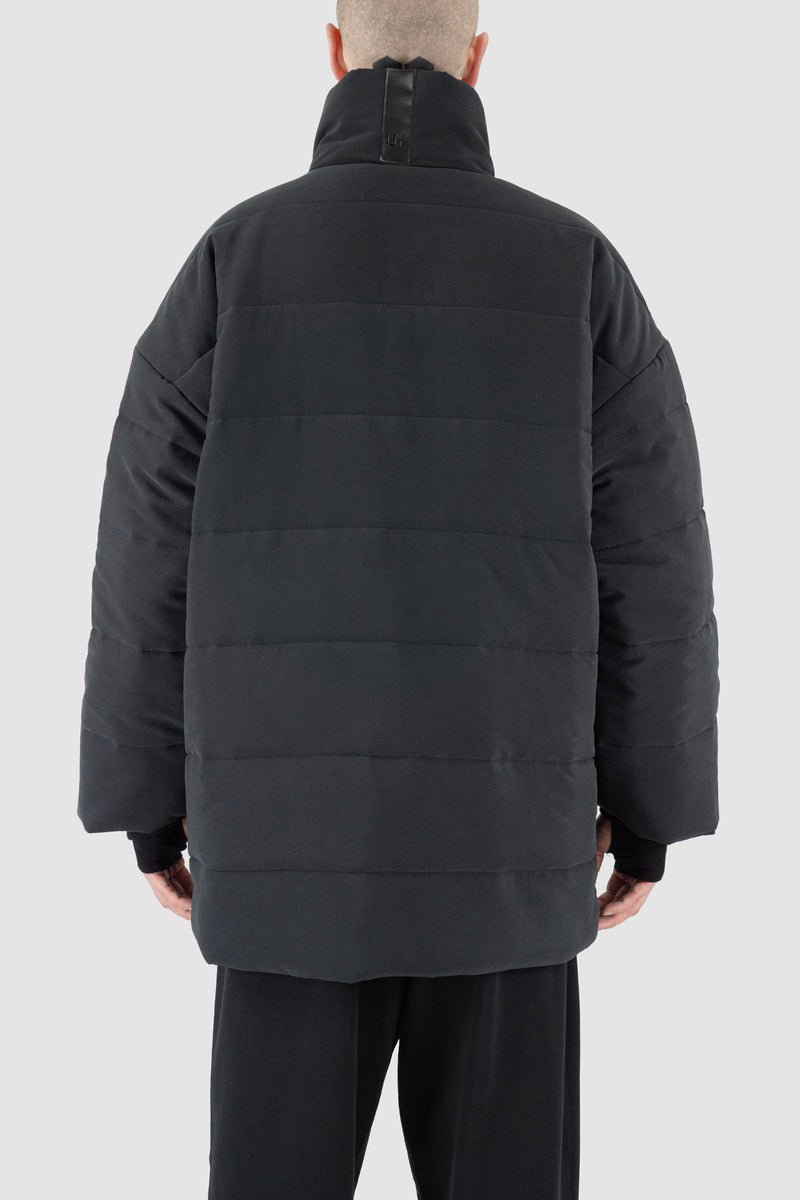 Back View of Warm FW23 Black Puffer Coat by UY Studio