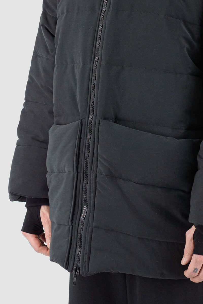 Close-Up of FW23 Black Puffer Coat - High Neck Collar and Ribbed Knit Cuffs by UY Studio
