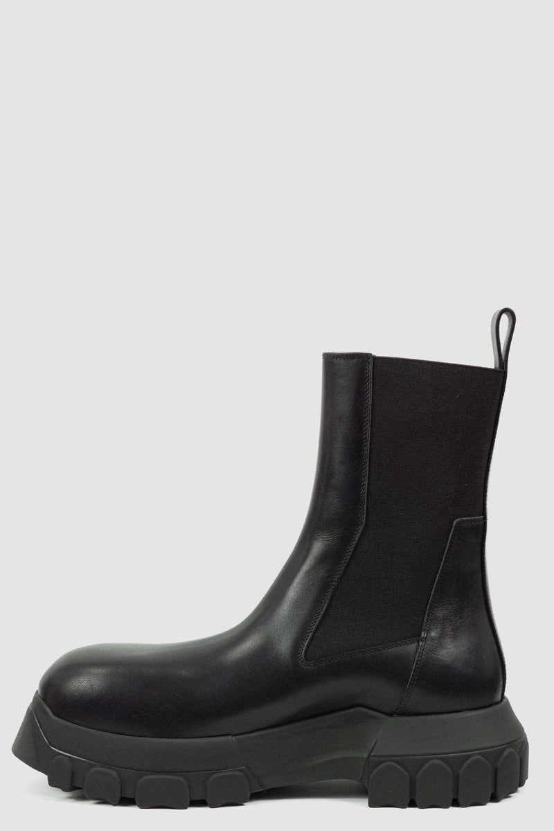 Rick Owens Black Bozo Tractor Boots for Men from the FW21 Collection with Elastic Rubber Band and pull tab Detail, right inner view.