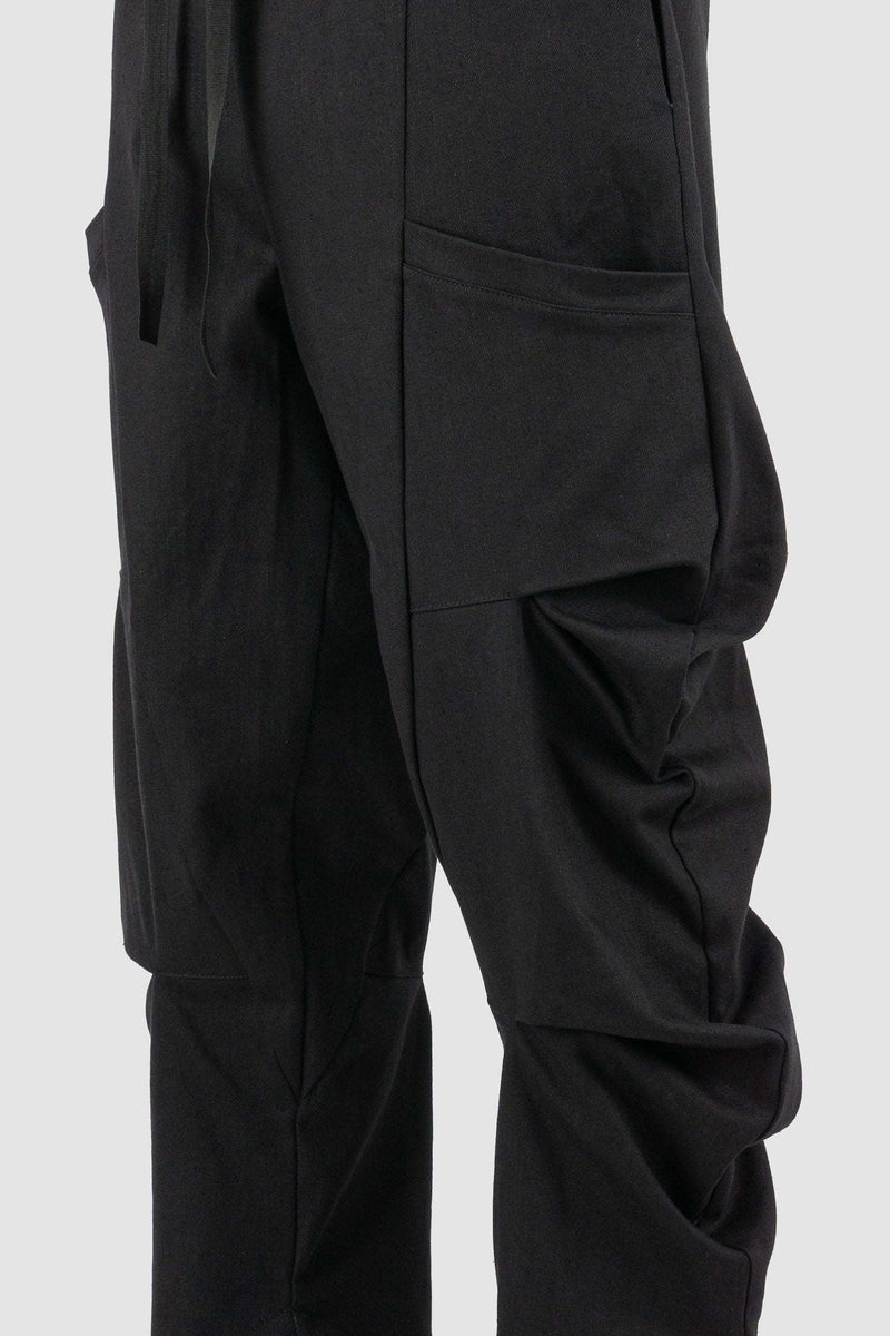 Close up view of Black Bull Denim Pants for Men with elastic waistband and cargo side pockets, LA HAINE INSIDE US